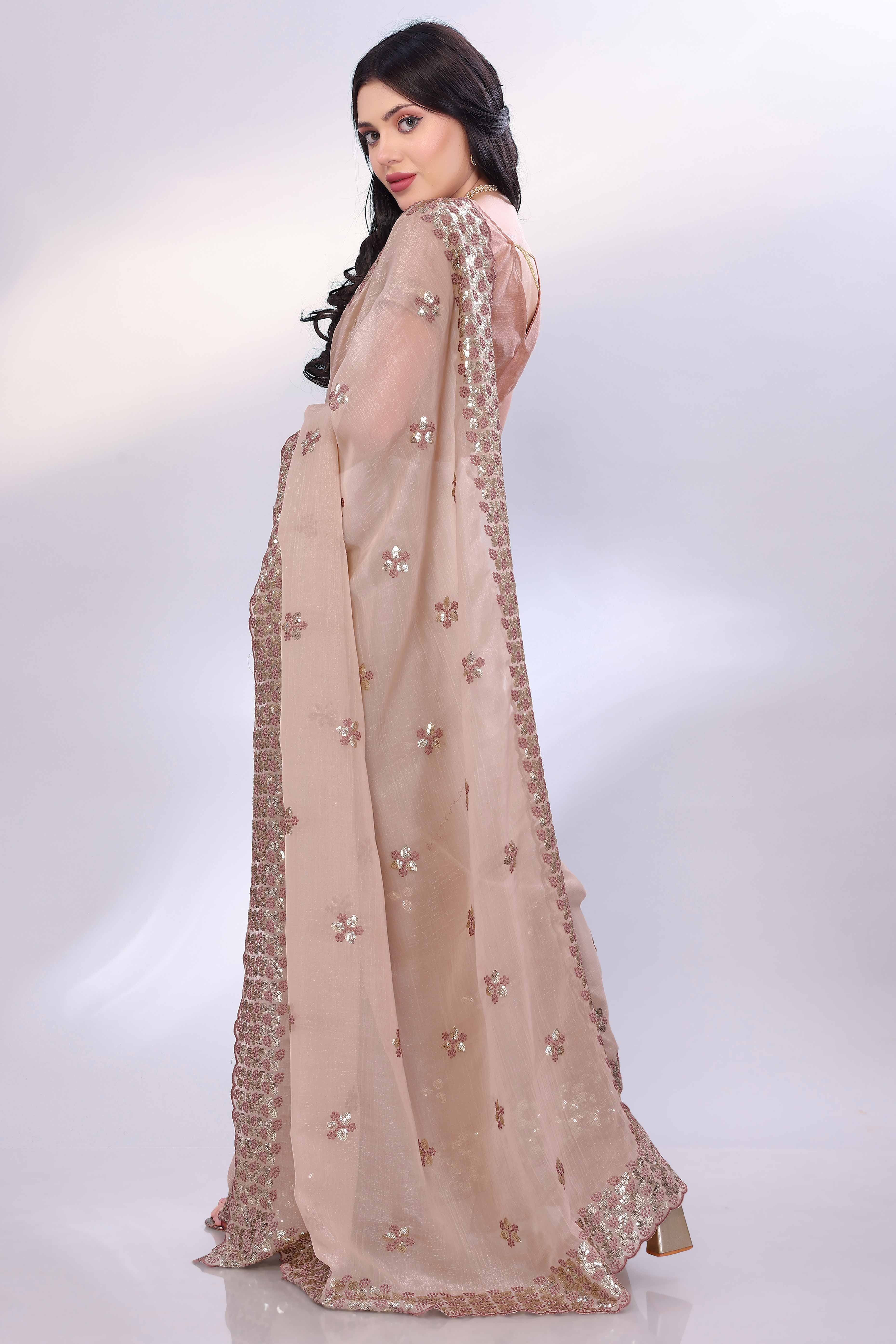Beige Crunchy Organza Silk Saree Adorned With Intricate Floral Sequins Embroidery