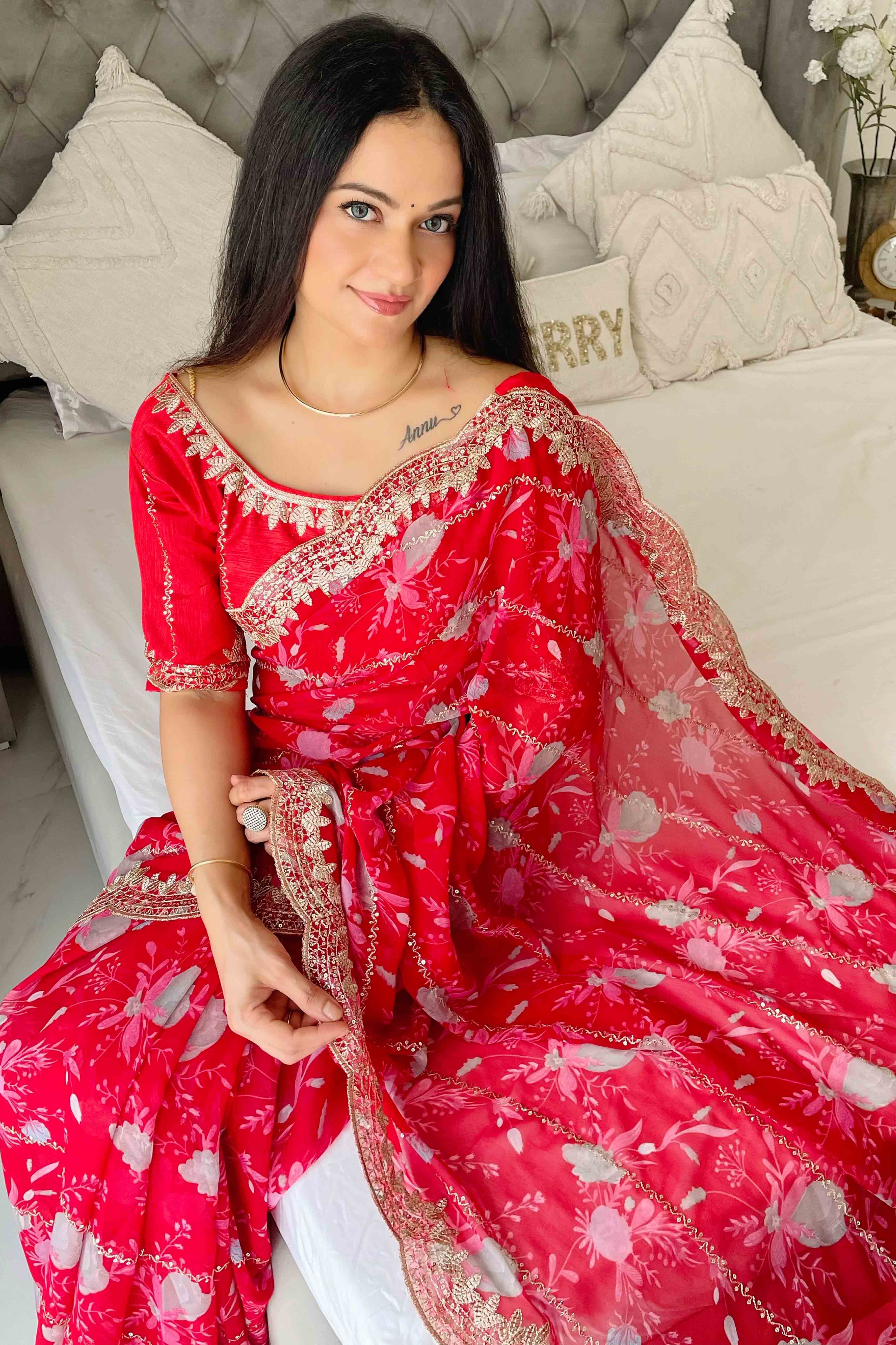 Rani Pink Floral Zari Embroidered Georgette Saree With Sparkling Sequin Embellishments