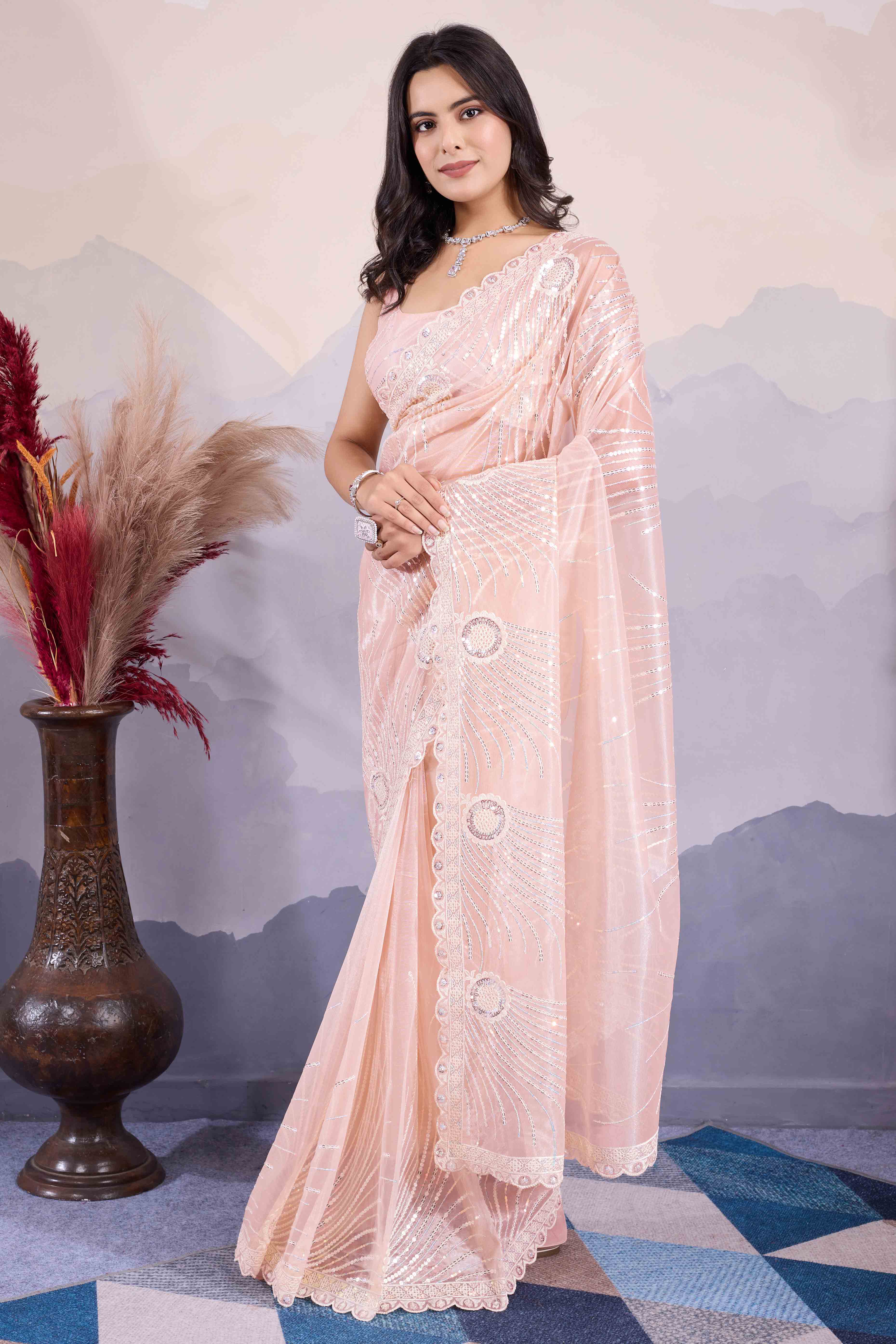 Peach Sequins Embroidered Twill Net Saree