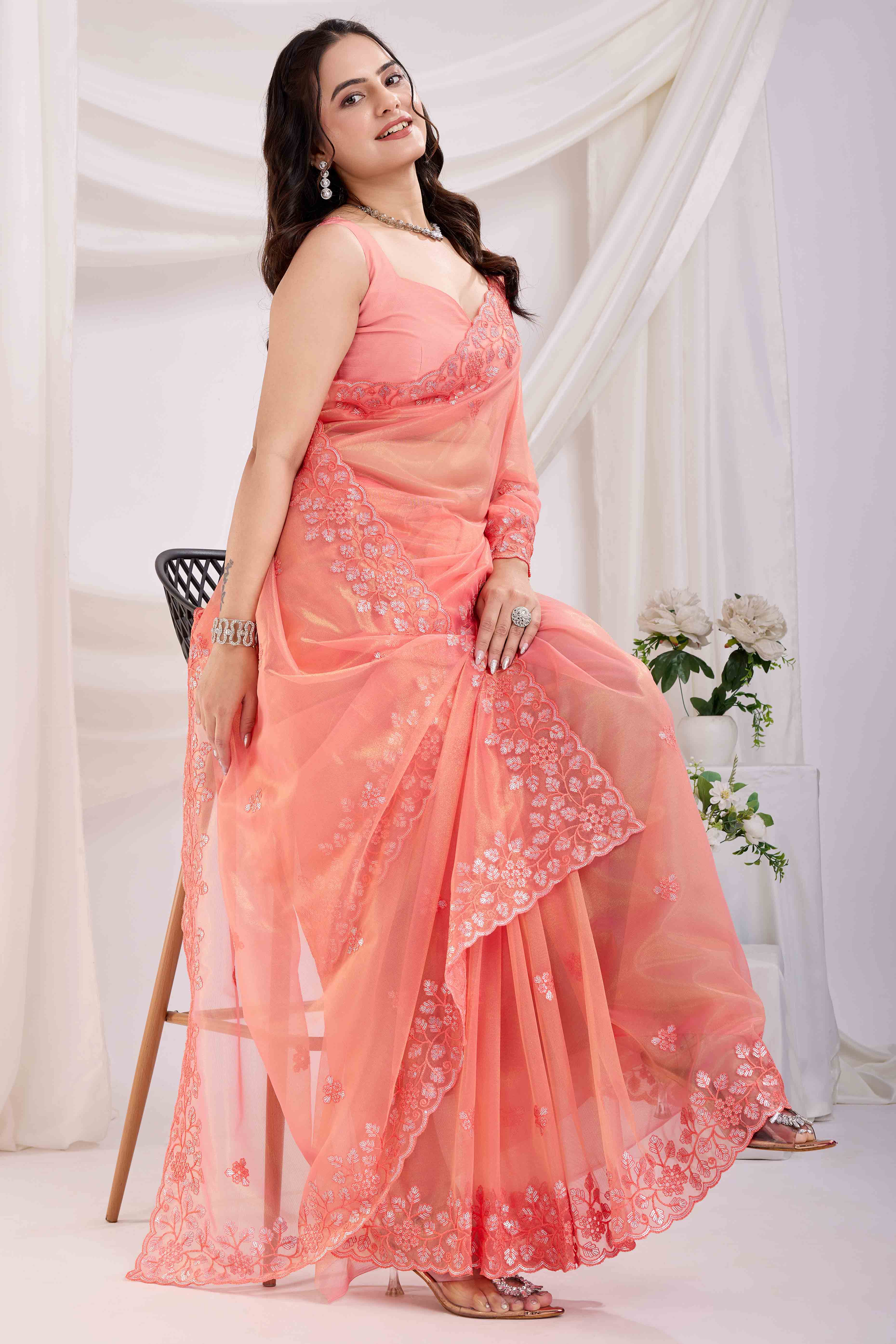 Peach Floral Sequins Embroidered Twill Net Saree