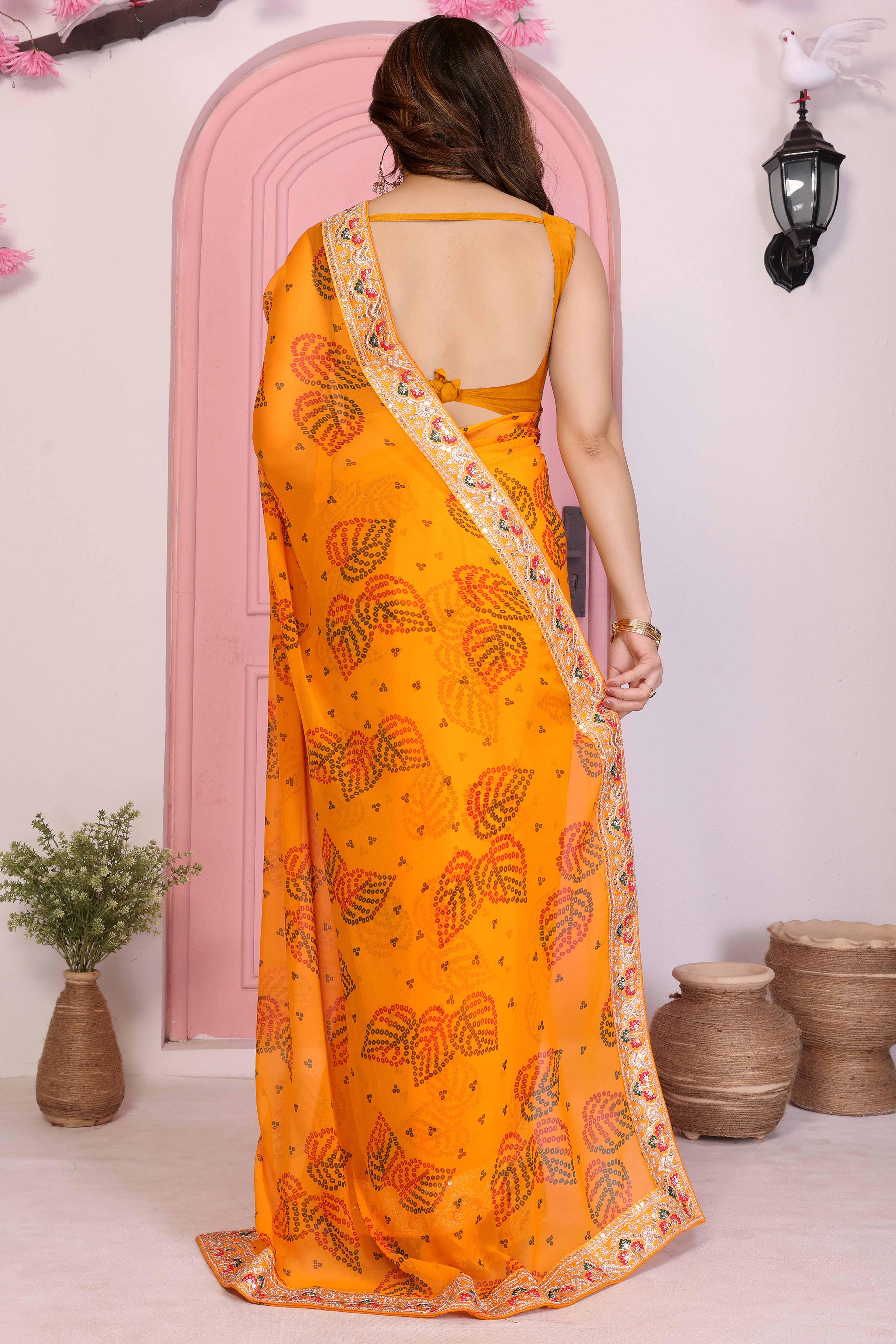 Mustard Georgette Saree with Traditional Bandhani Print and Lace Accents