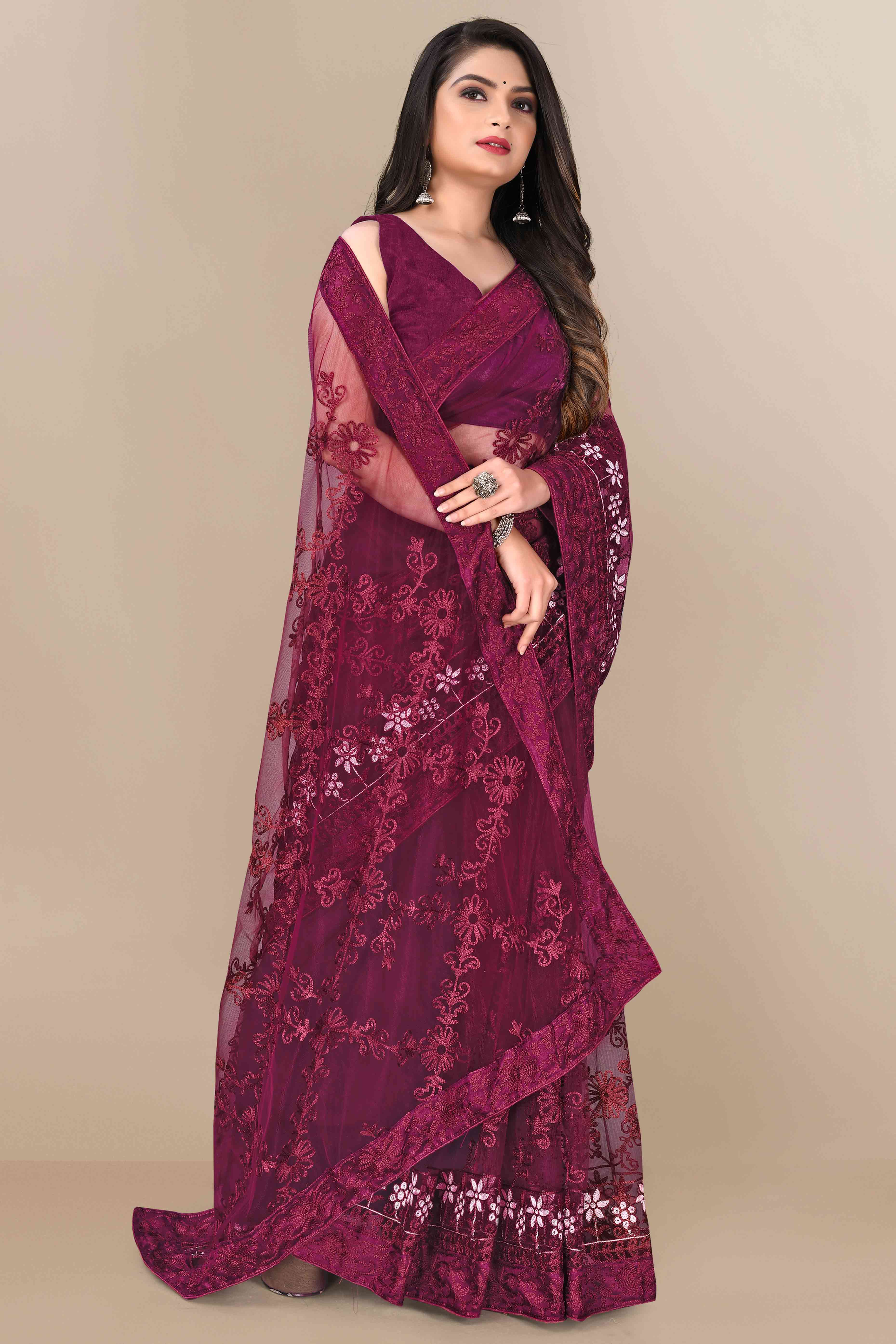 Wine Party Wear Net Saree Featuring Rich Floral Embroidery