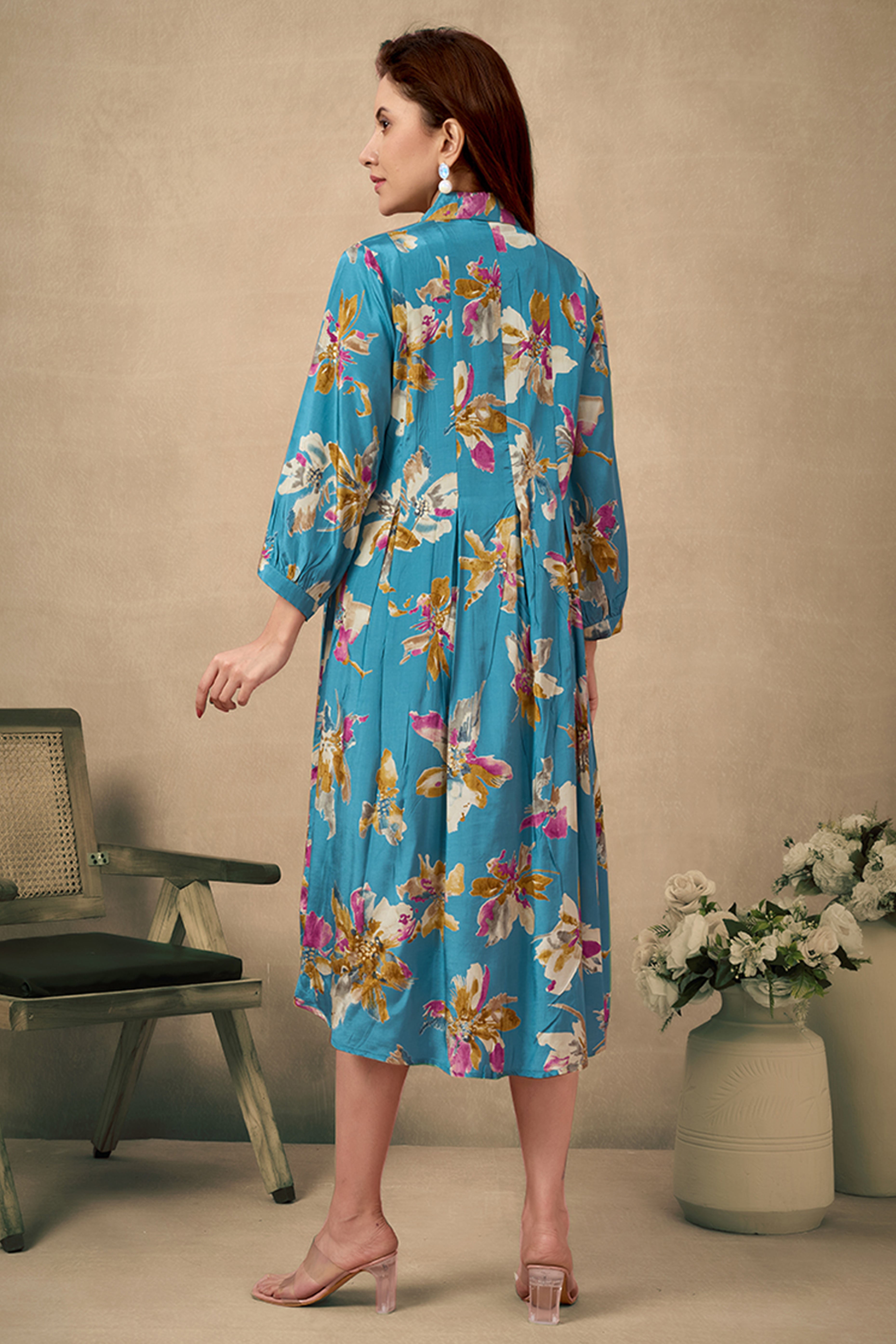 Turquoise Floral Printed Muslin Dress with a Flattering A-Line Silhouette