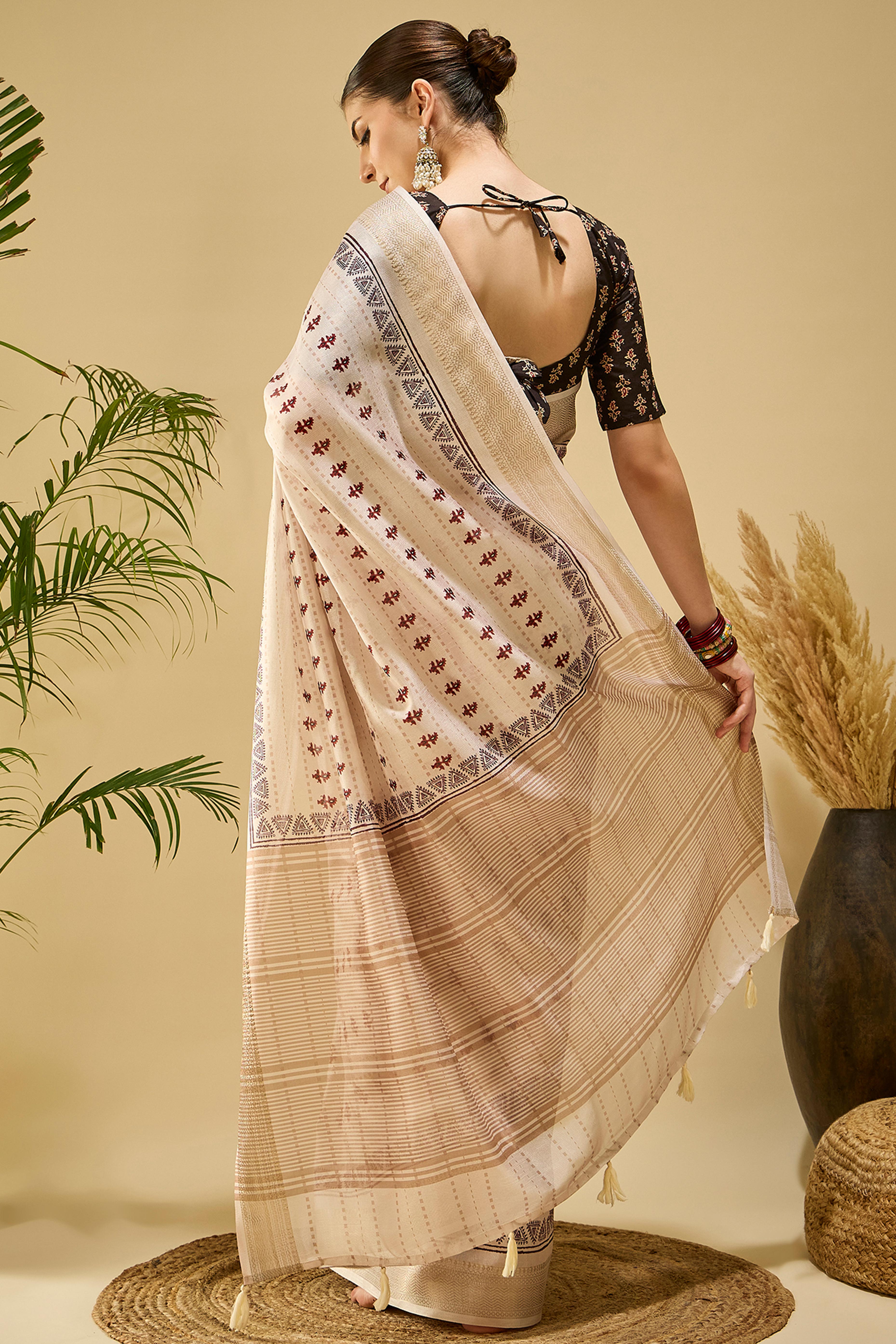 Elegant Cream Katki Cotton Silk Saree With Delicate Floral Prints & Tassel Pallu