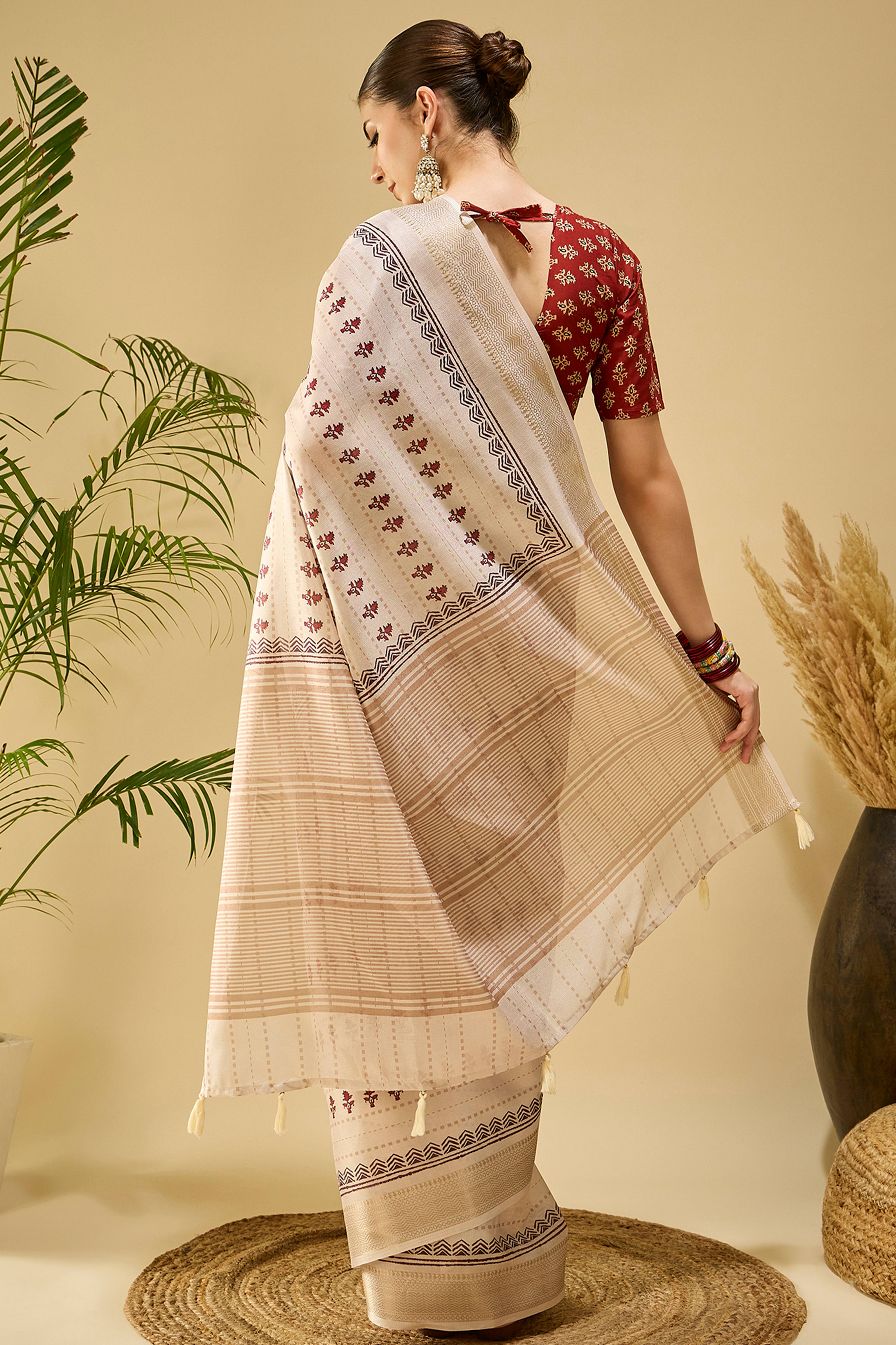 Soft Cream Katki Cotton-Silk Saree With Subtle Floral Motifs & Tassel Edge Pallu