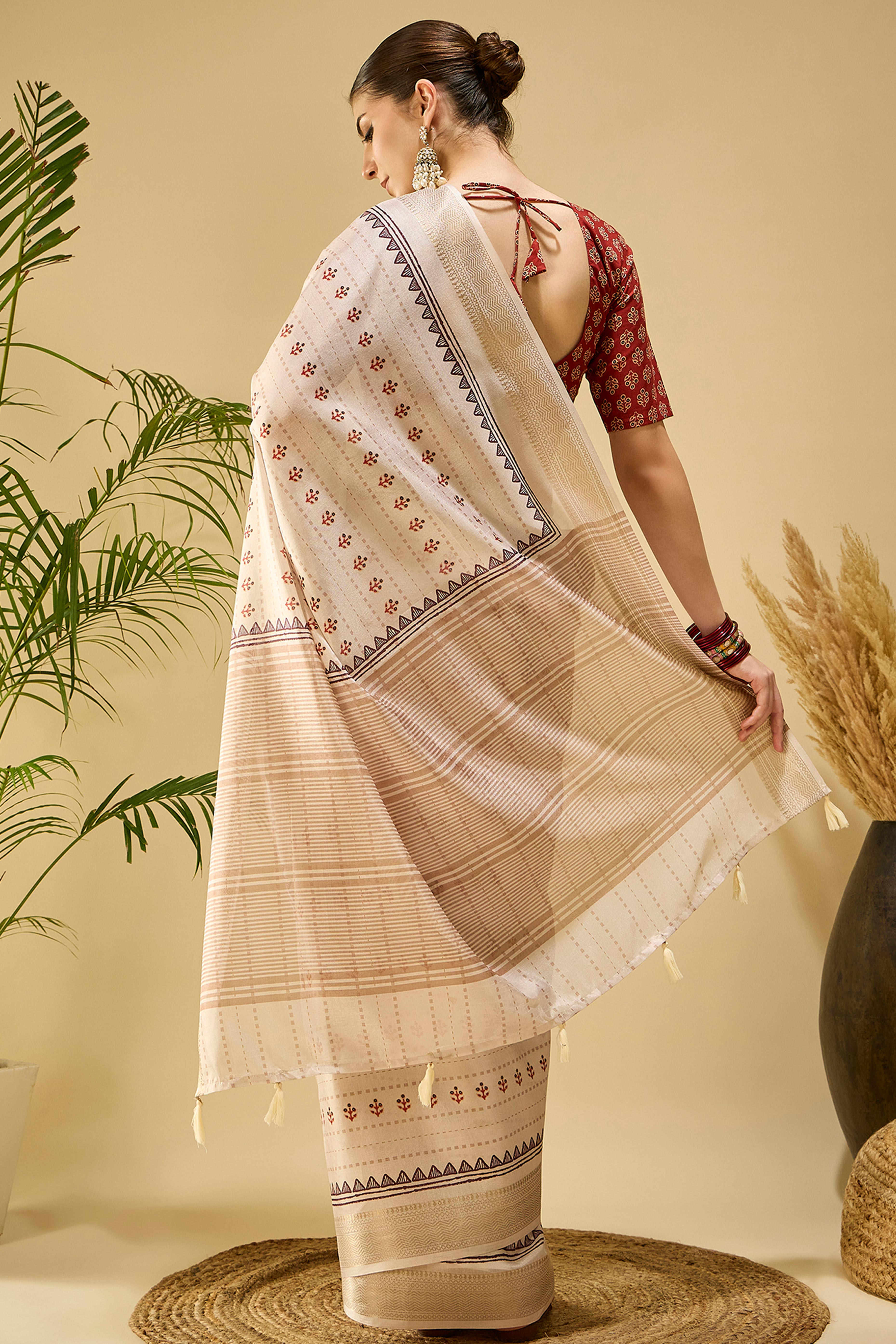 Charming Cream Floral Print Katki Cotton Silk Saree Featuring Stylish Tassel Pallu