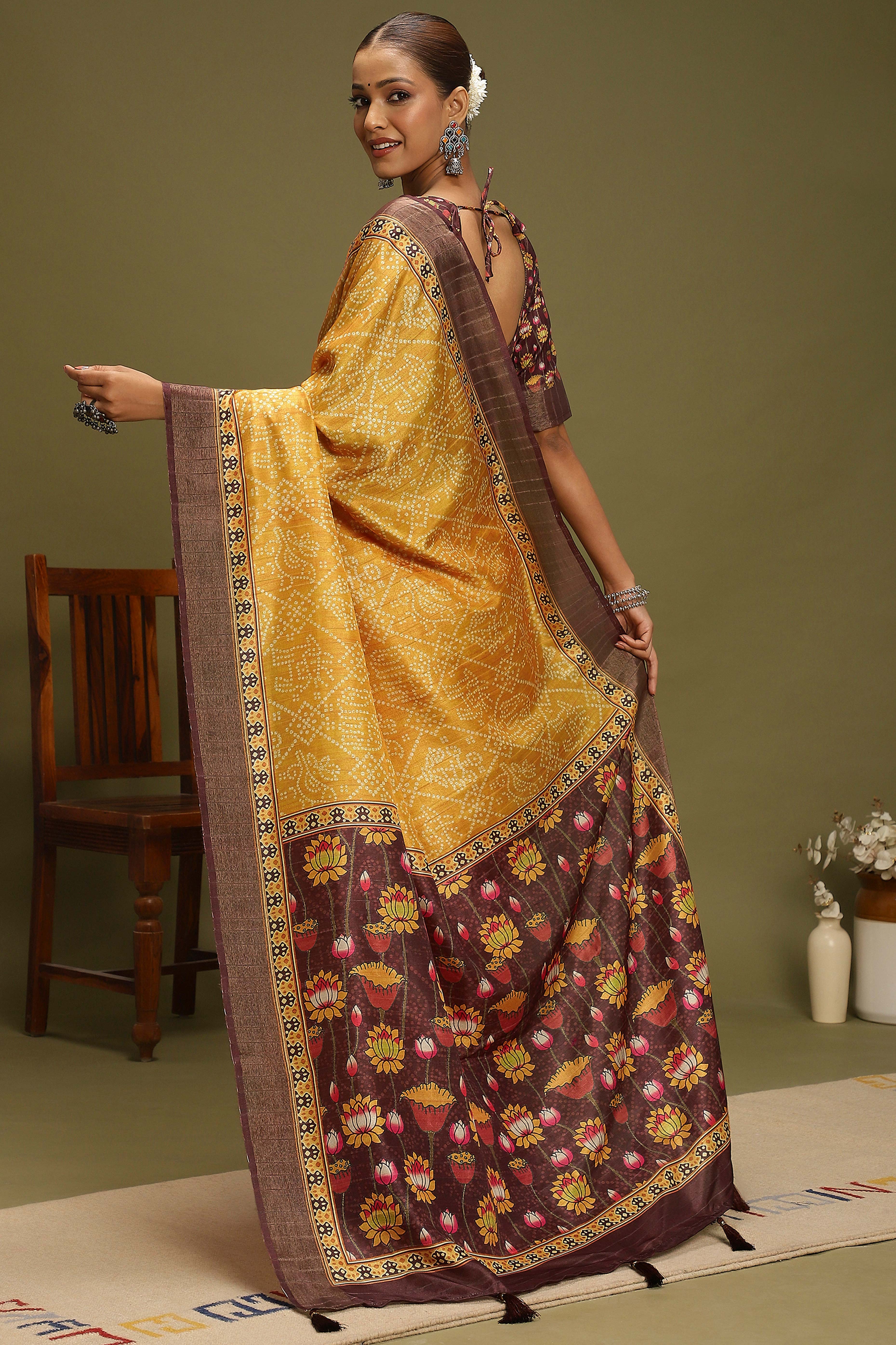 Yellow Silk Blend Saree Decorated with Vibrant Bandhani Prints and Festive Detailing