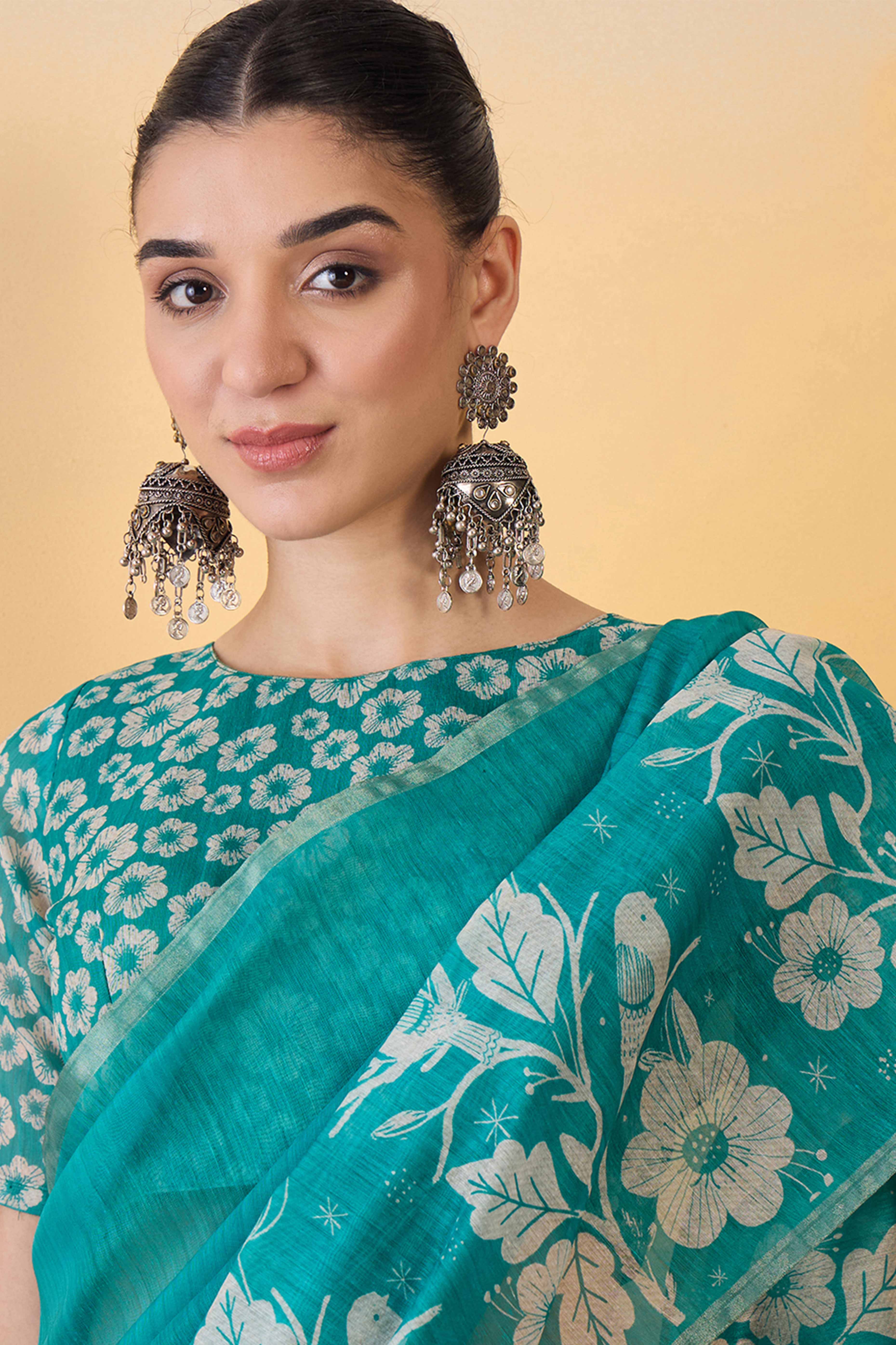 Turquoise Linen Cotton Saree Featuring Elegant Floral & Bird Prints With Tassel Pallu