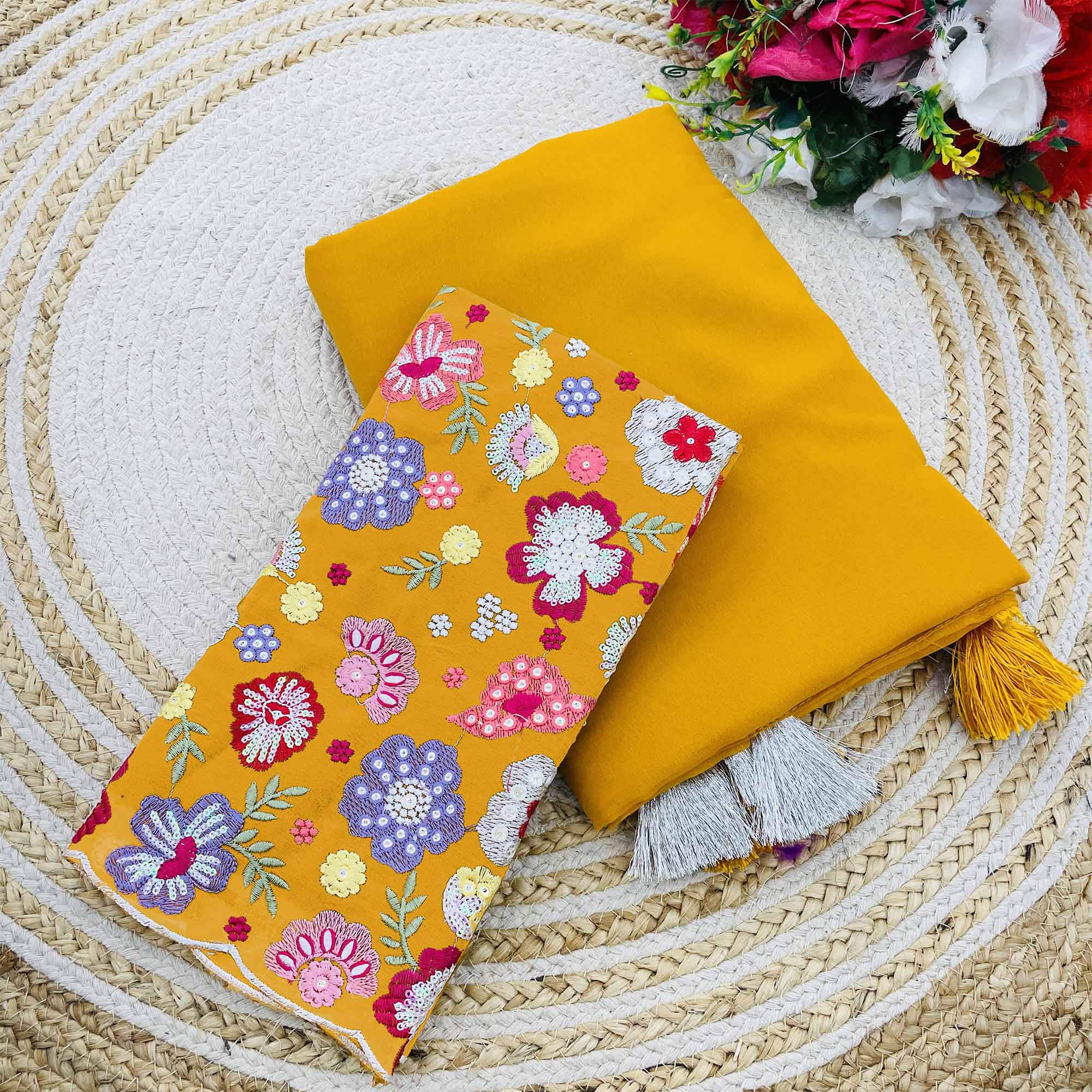 Yellow Solid Georgette Saree With Tassels