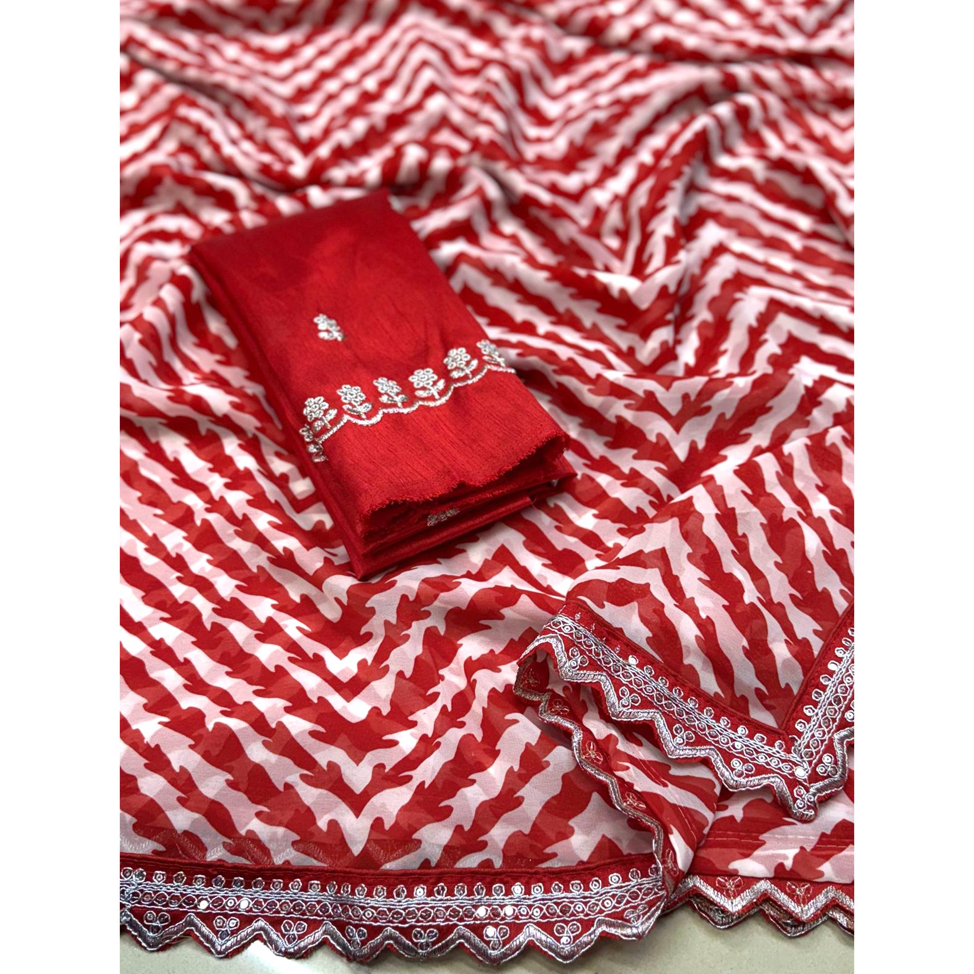 Red Zig Zag Printed Georgette Saree With Sequins Embroidered Border