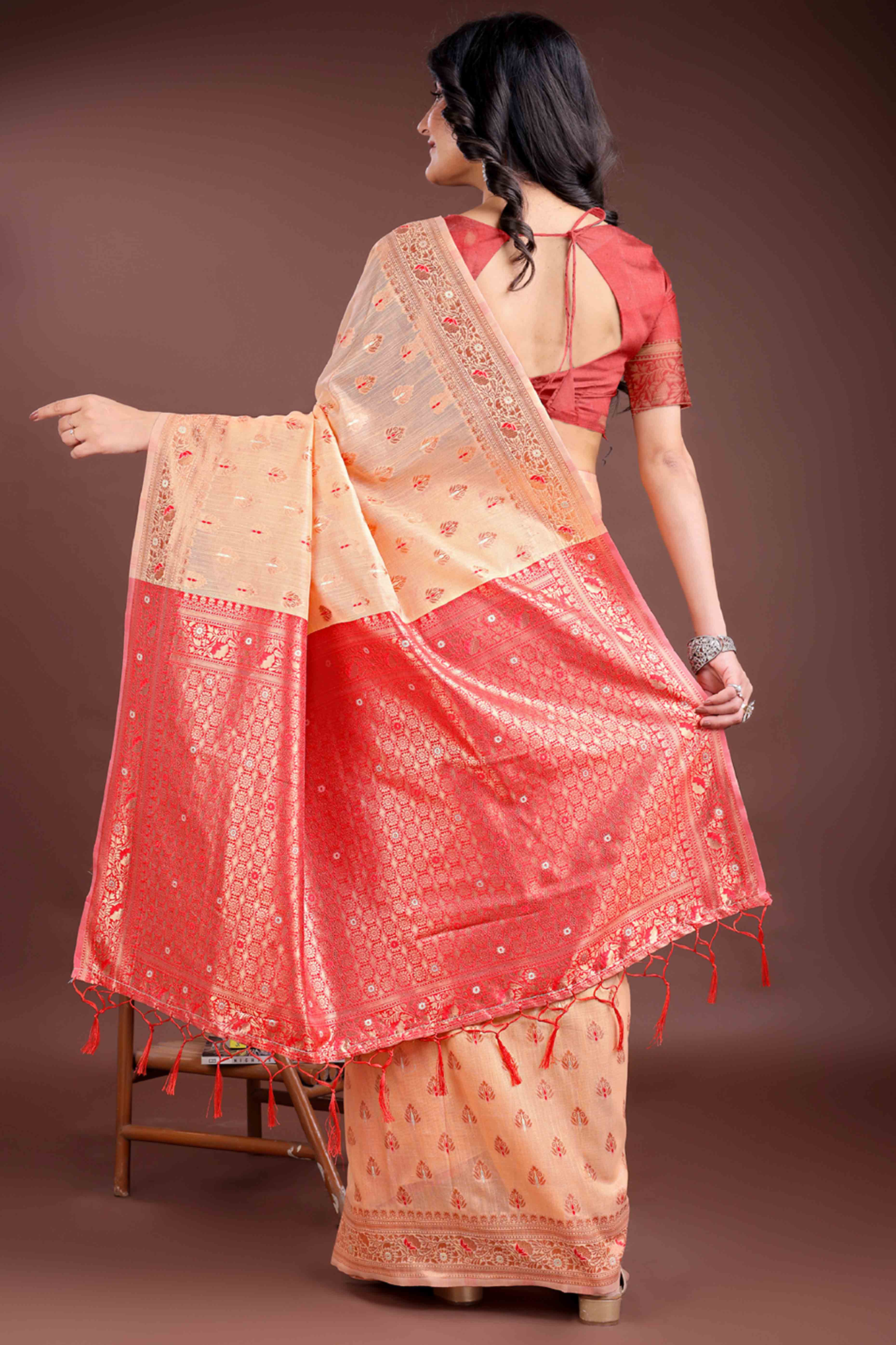 Vibrant Orange Floral Zari Weaving Cotton Blend Saree with Eye-Catching Tassels