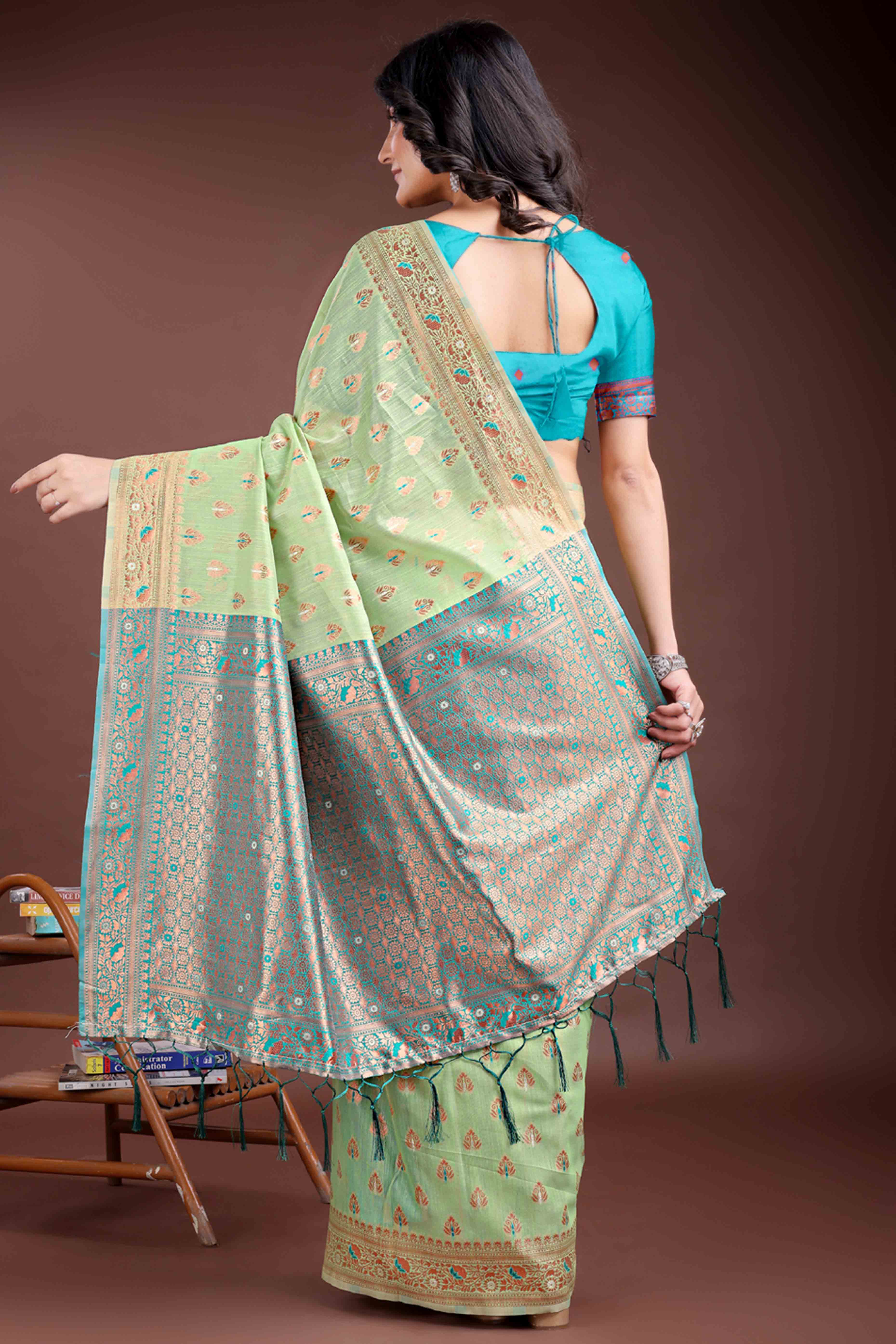 Harmonious Light Green Floral Zari Weaving Cotton Blend Saree with Graceful Tassels