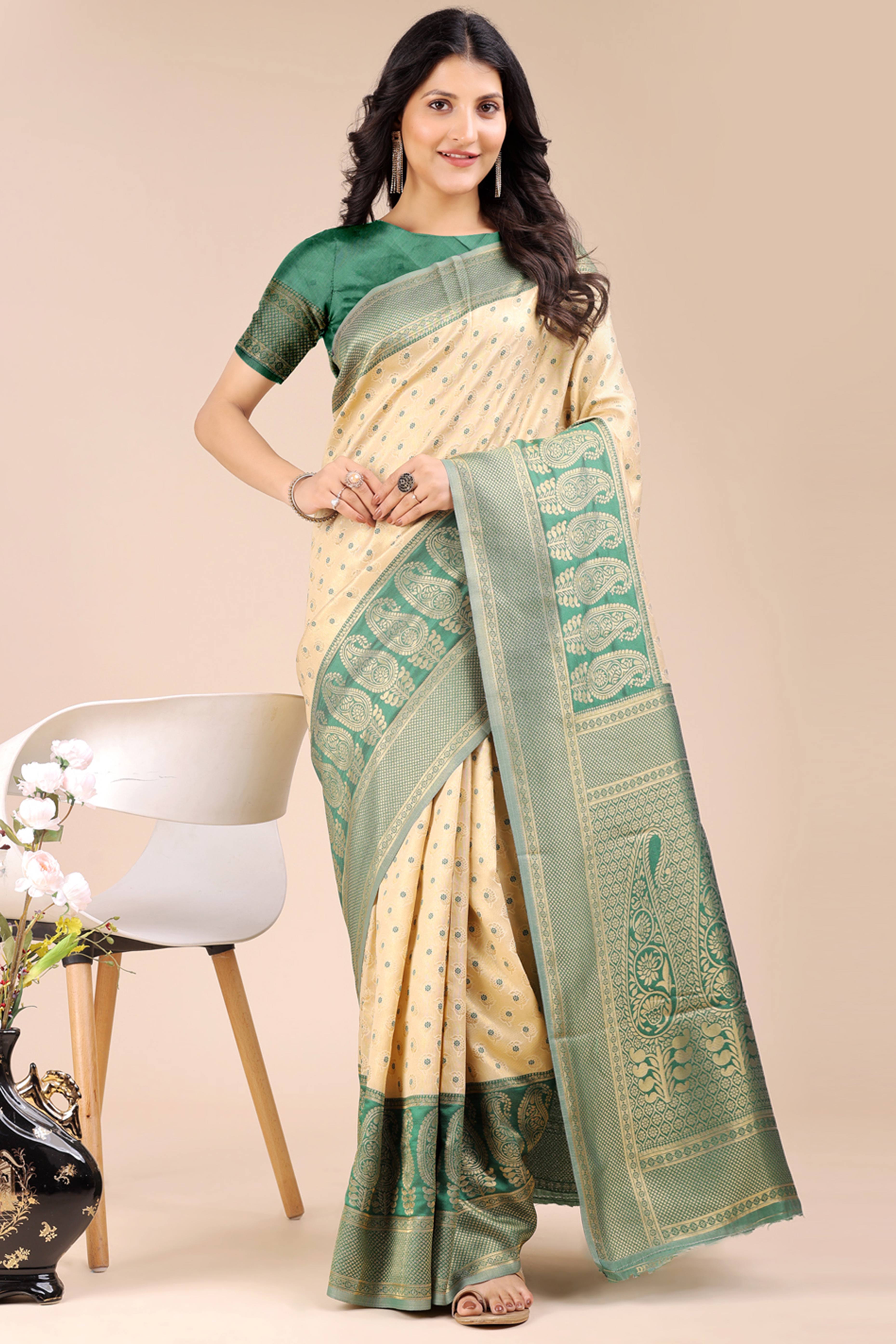 Cream Banarasi Silk Saree Featuring Lustrous Green Floral Zari Weaving and a Rich Contrast Border