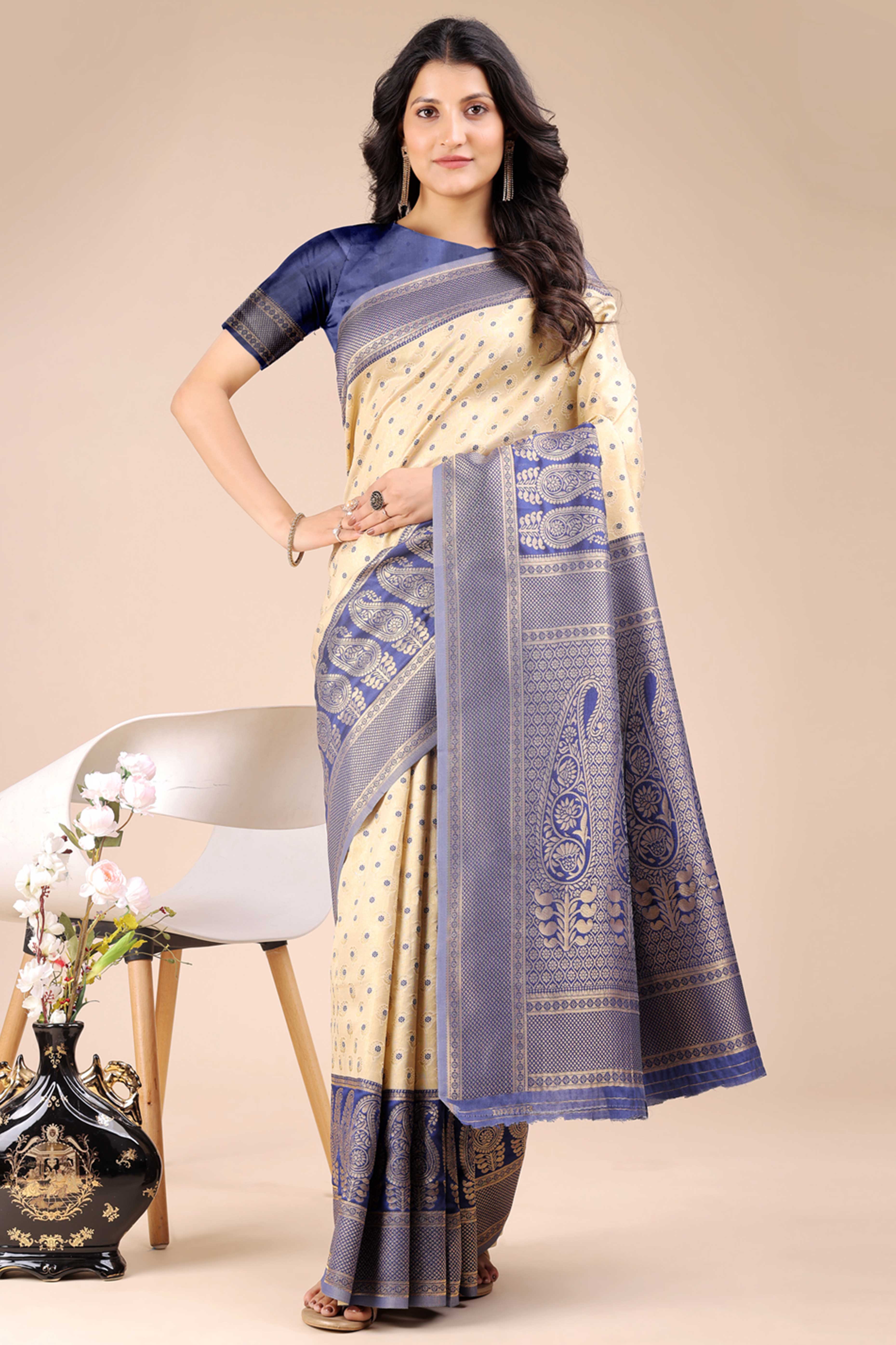 Cream Banarasi Silk Saree Featuring Lustrous Navy Blue Floral Zari Weaving and a Rich Contrast Border