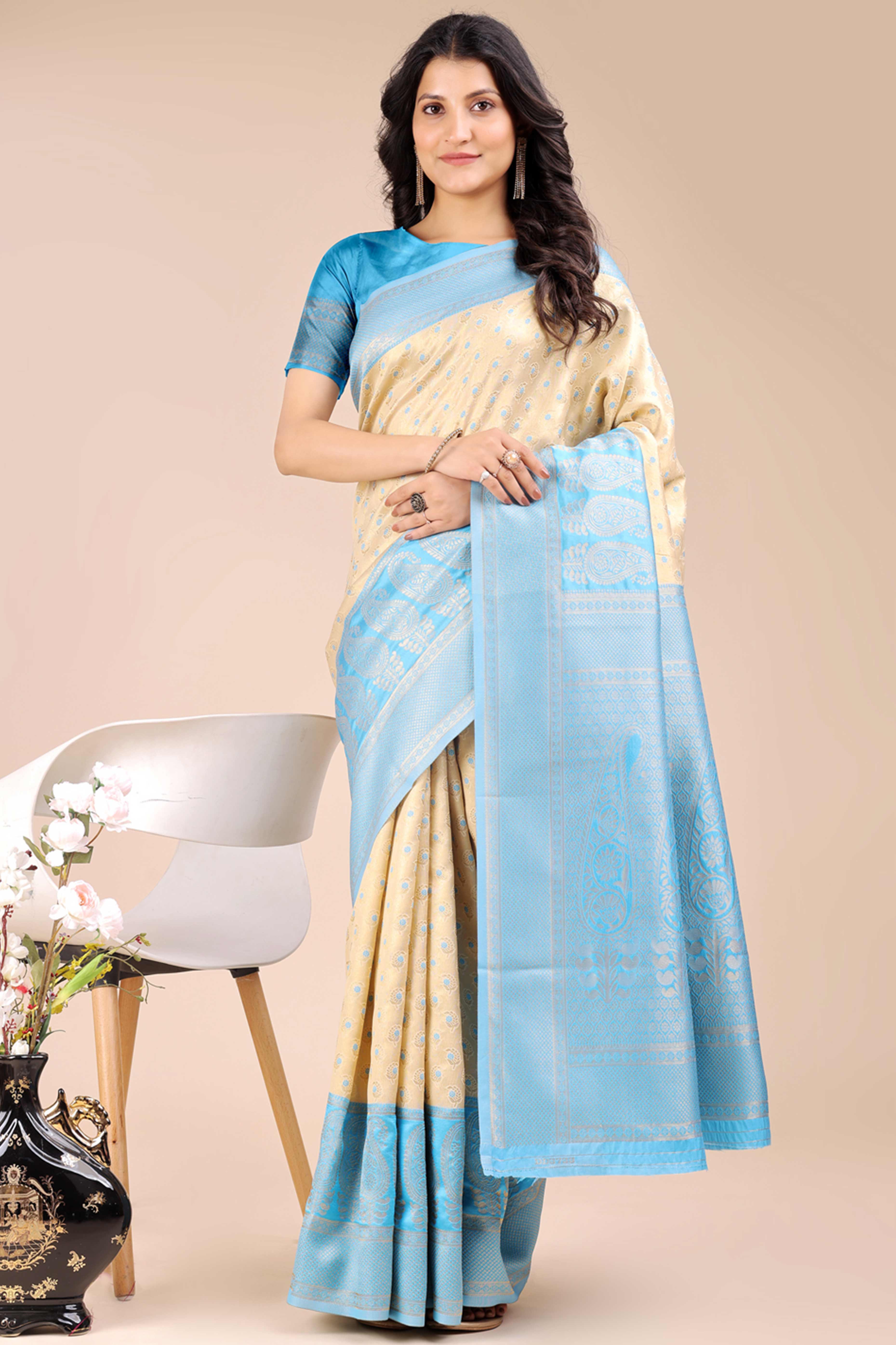 Cream Banarasi Silk Saree Featuring Lustrous Sky Blue Floral Zari Weaving and a Rich Contrast Border