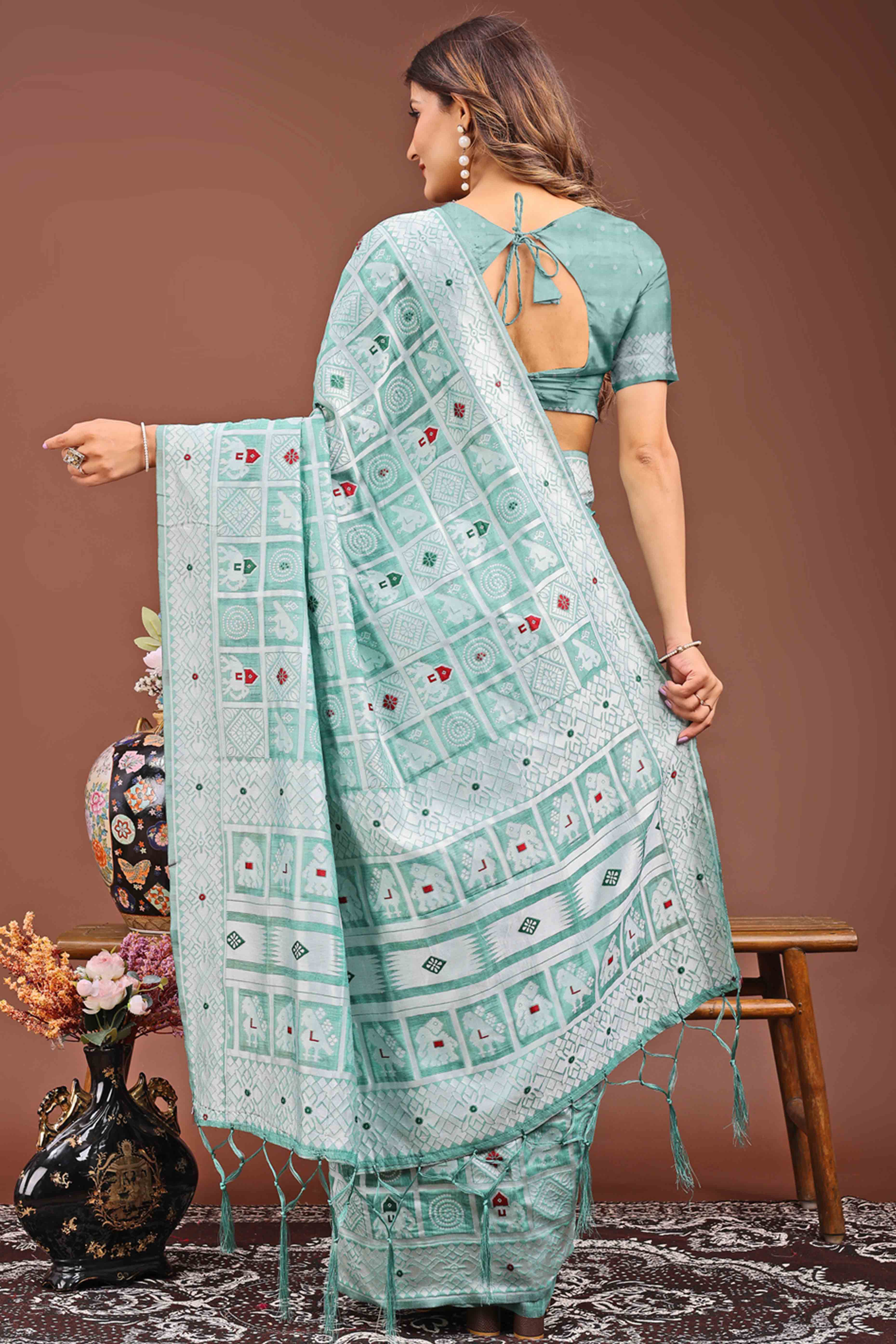 Green Linen Cotton Saree Adorned With Zari Weaving & Tassel pallu