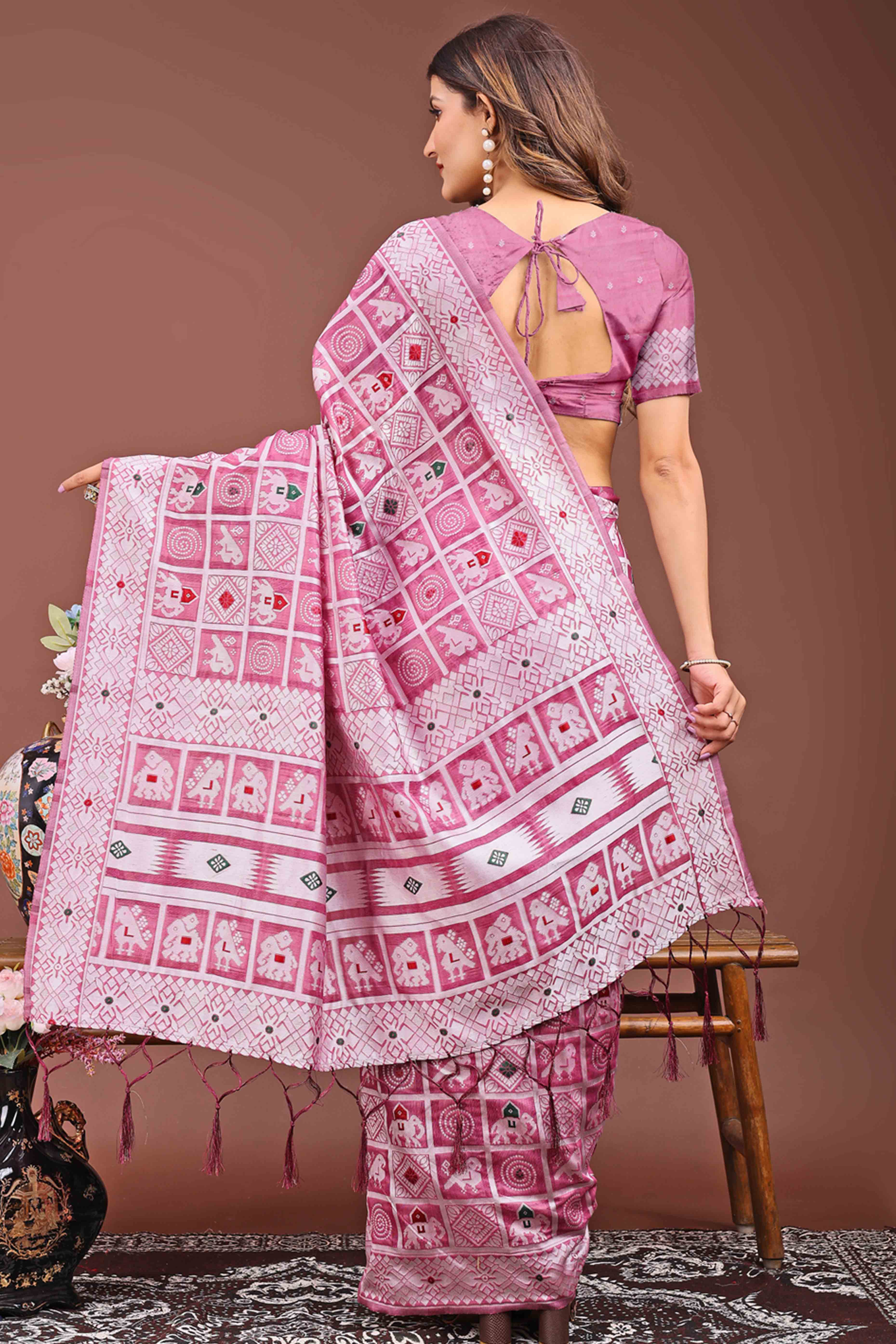 Pink Linen Cotton Saree Adorned With Zari Weaving & Tassel pallu