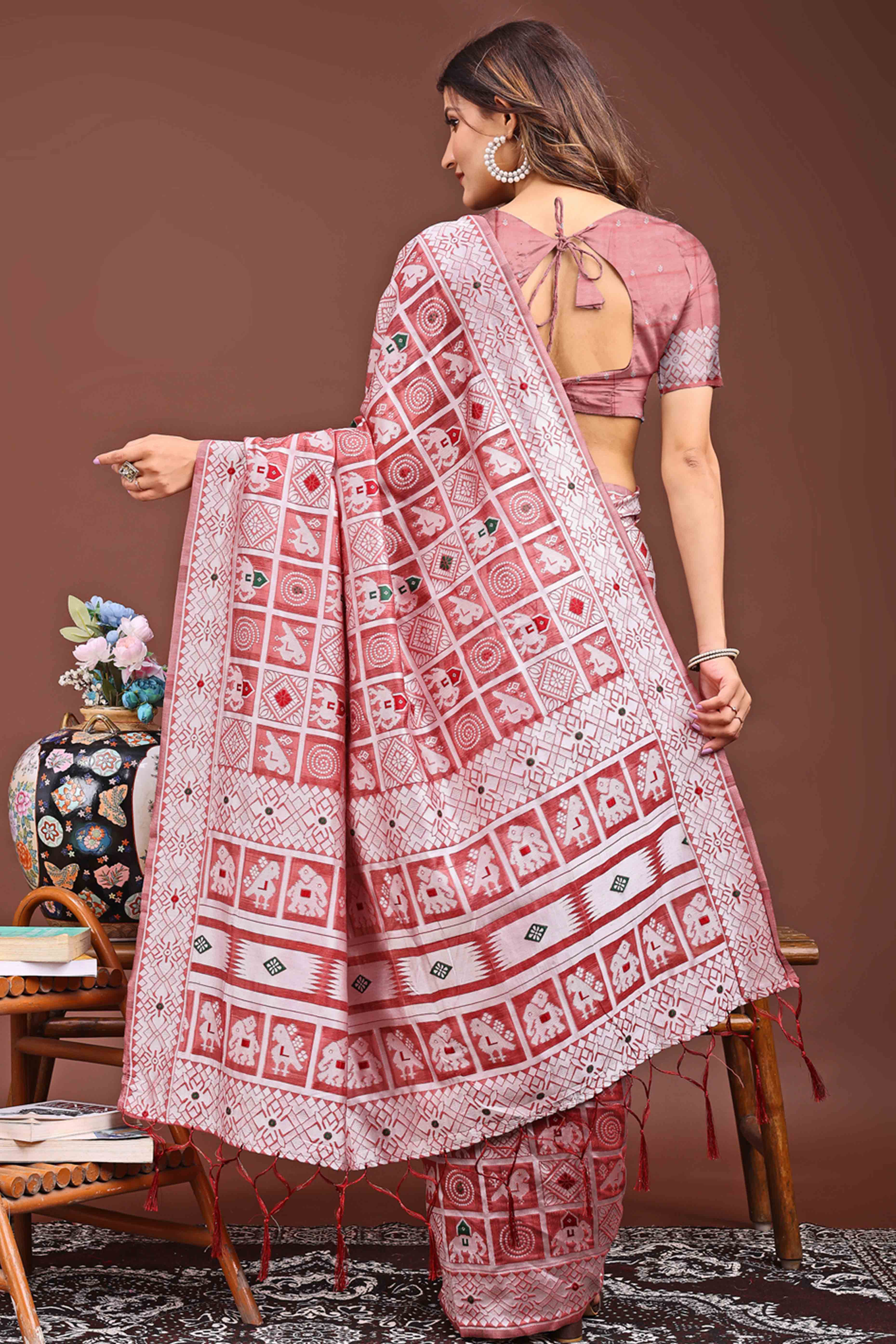 Peach Linen Cotton Saree Adorned With Zari Weaving & Tassel pallu