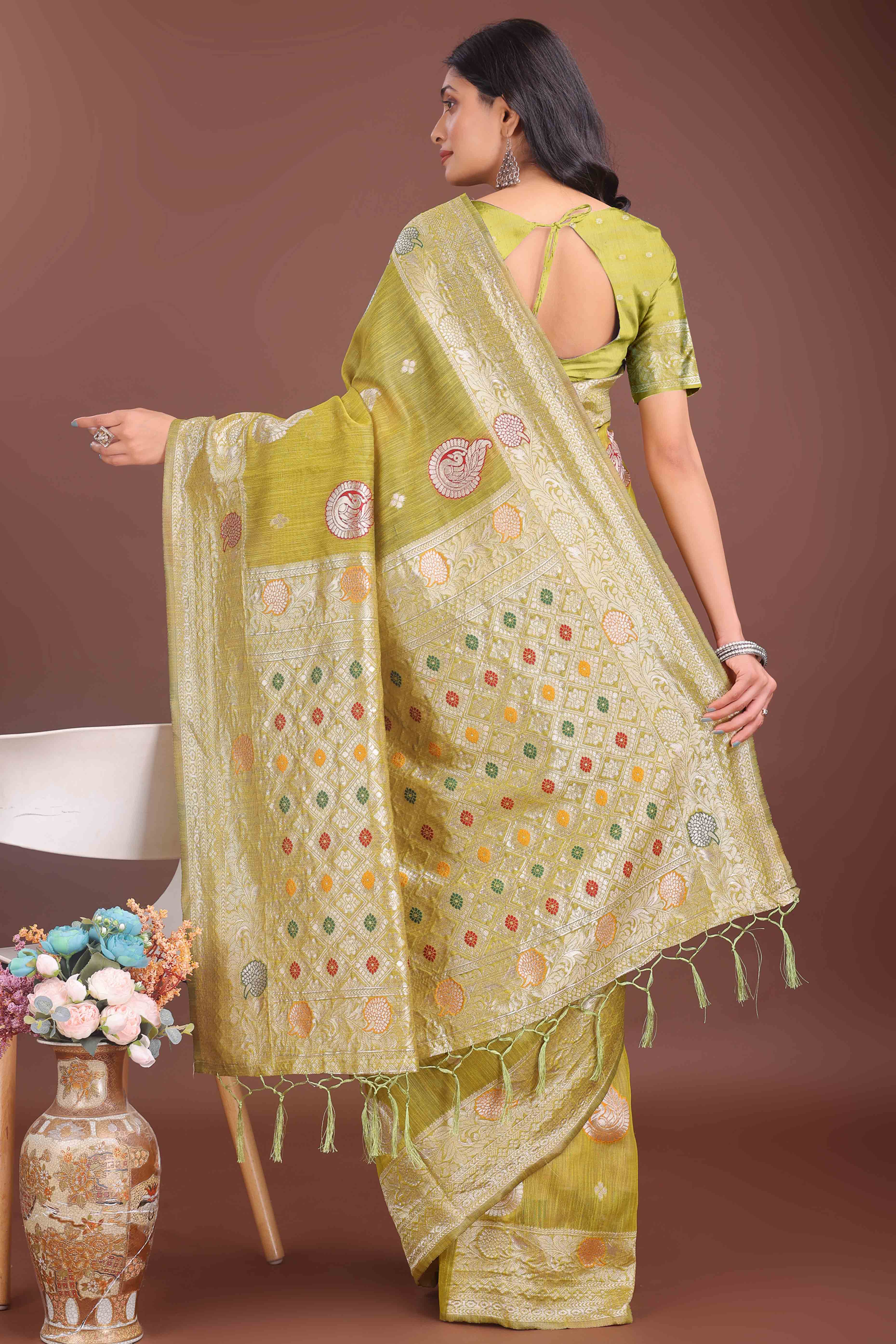 Green Lichi Cotton Blend Saree With Zari Floral Weaving & Tassel Detailing