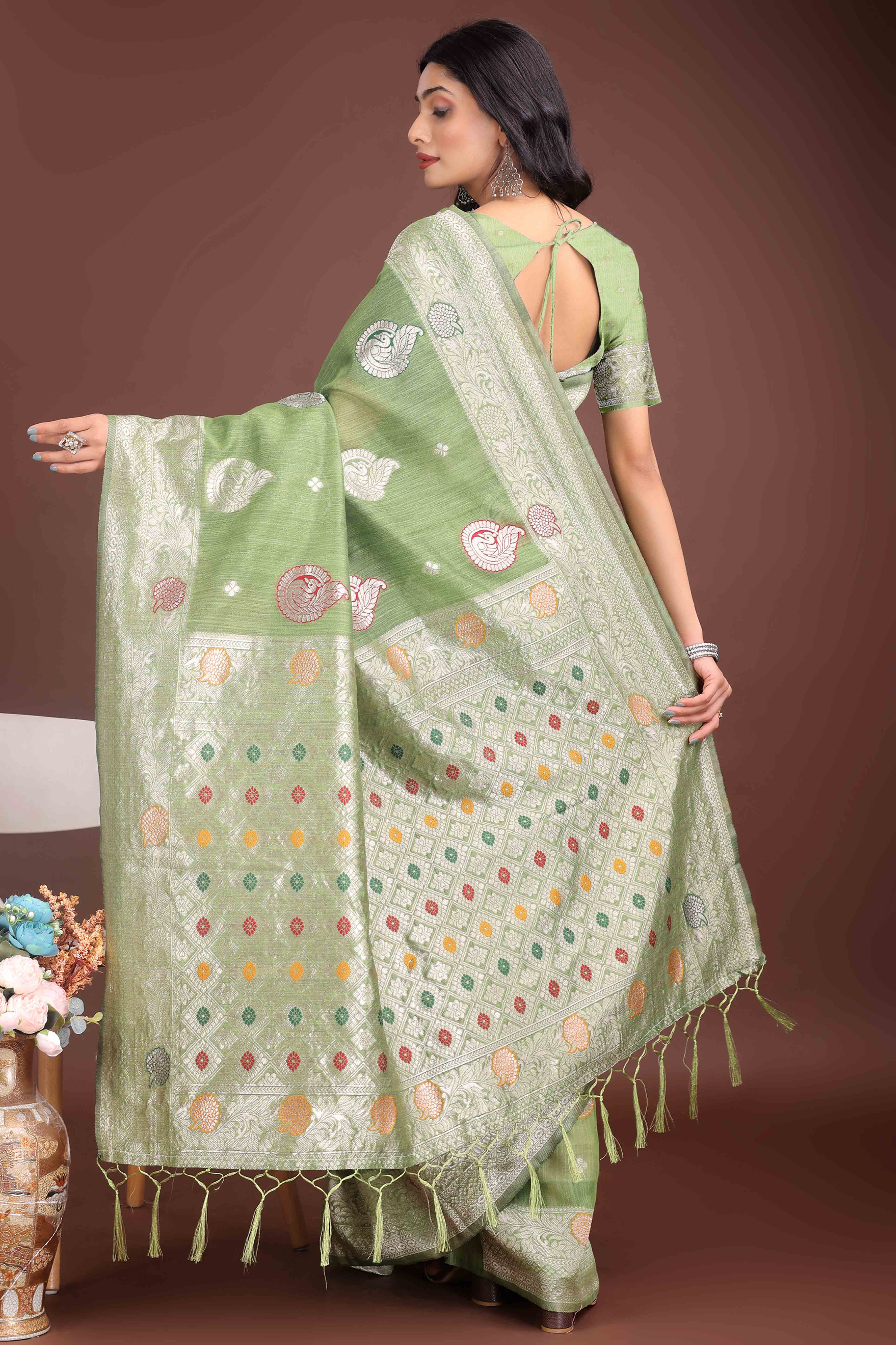 Light Green Lichi Cotton Blend Saree With Zari Floral Weaving & Tassel Detailing