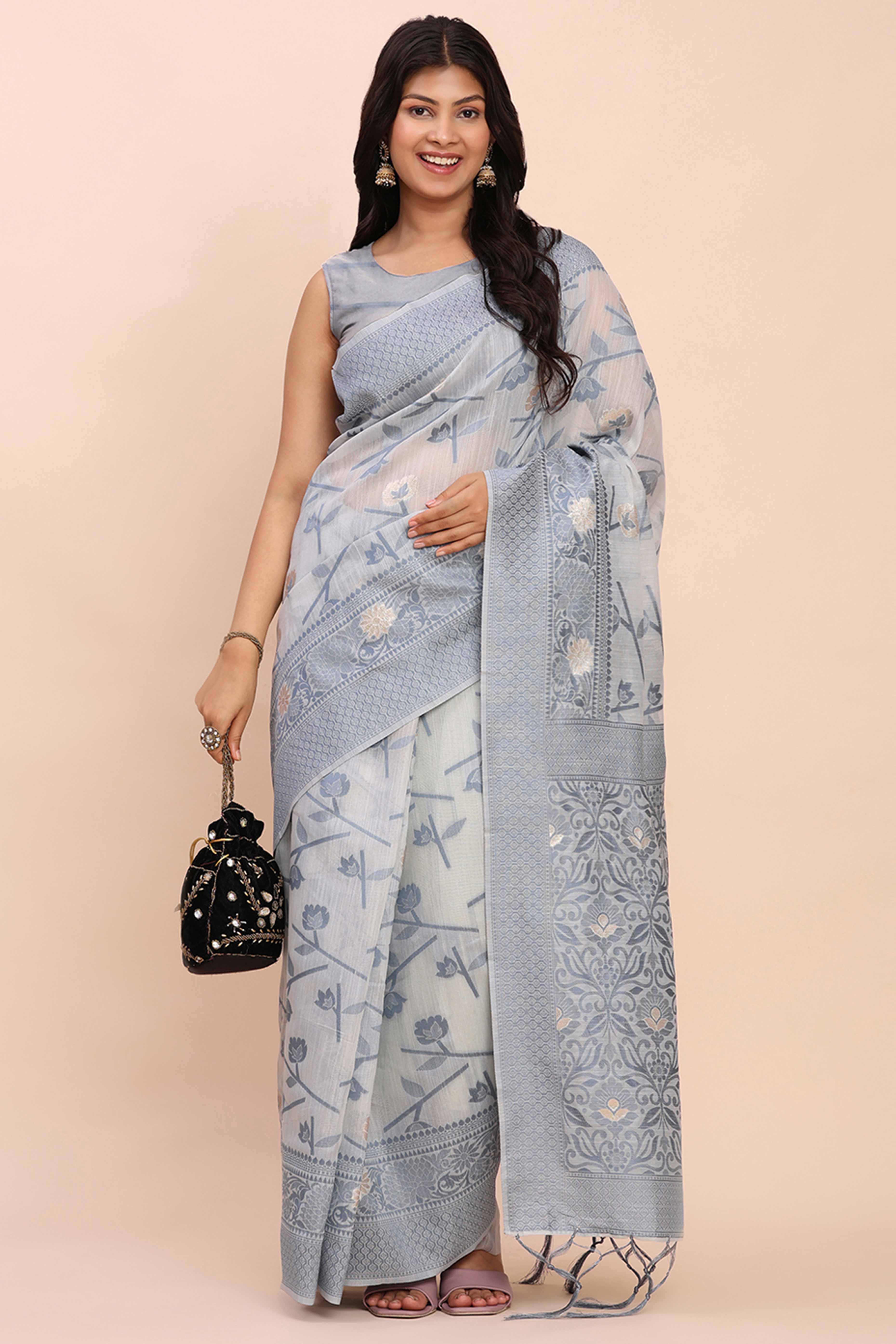 Grey Floral Linen Cotton Saree Accented With Zari Weaving & Tassel Pallu Elegance