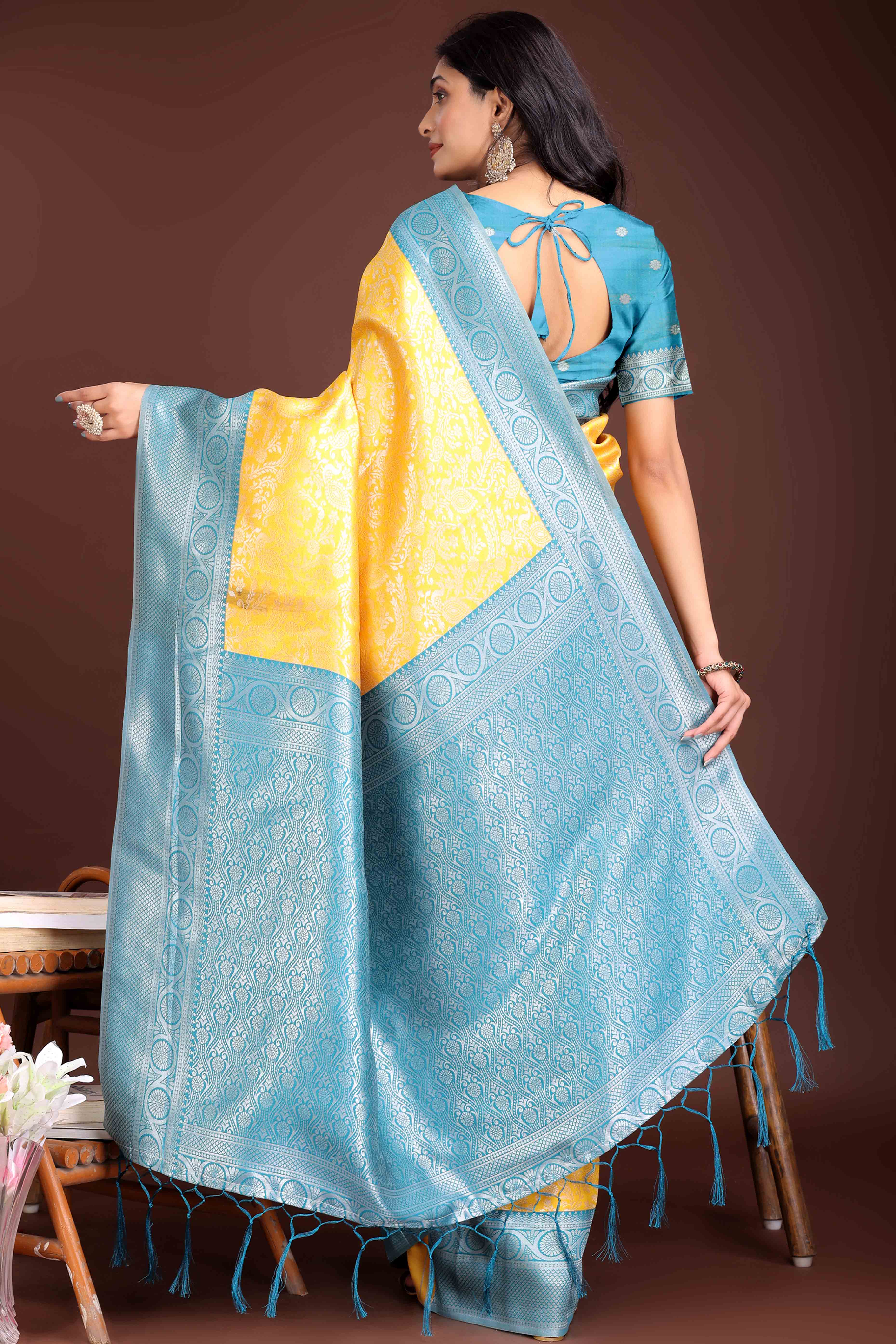 Yellow Floral Zari Weaving Lichi Cotton Silk Saree With Tassel Border