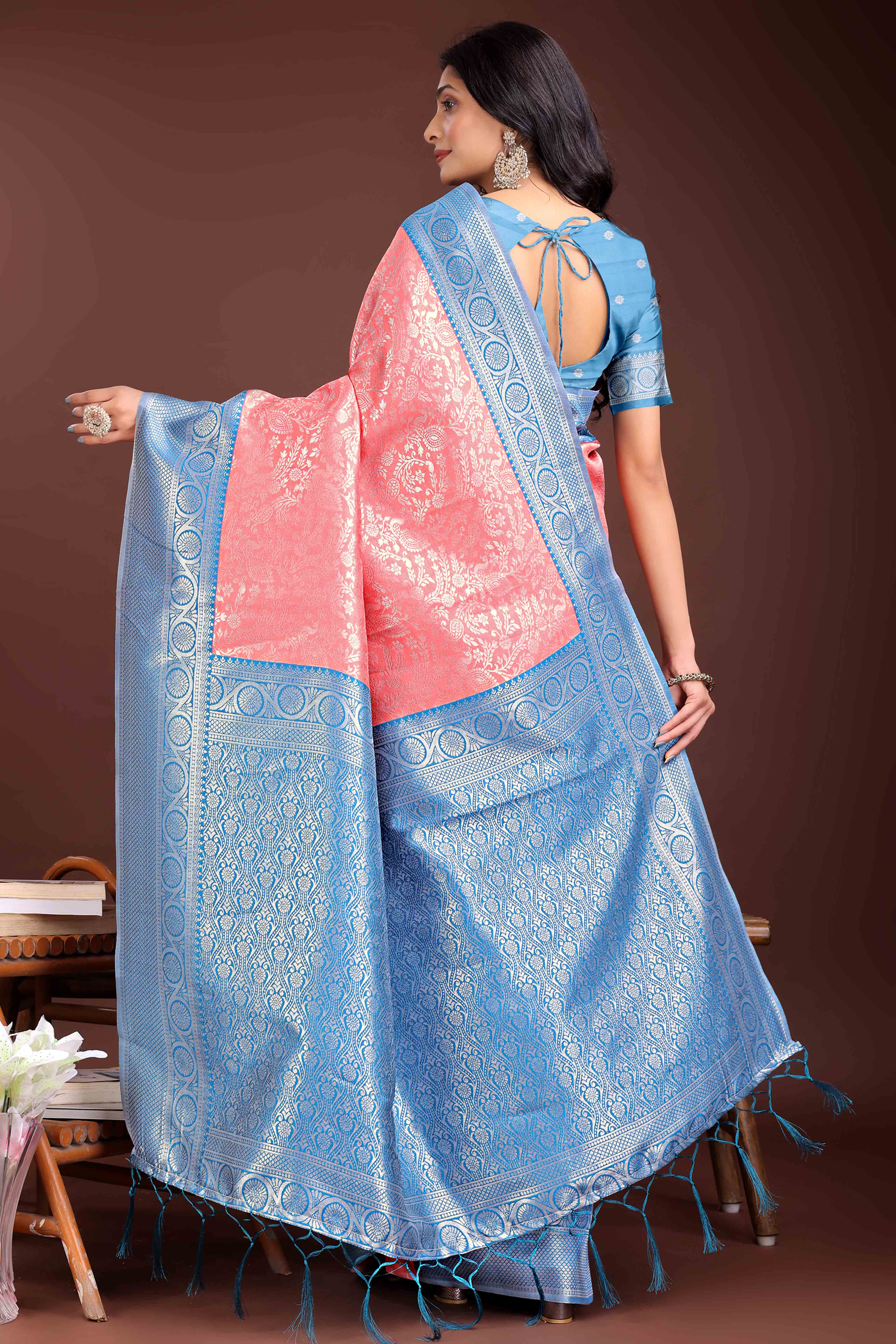 Peach Floral Zari Weaving Lichi Cotton Silk Saree With Tassel Border