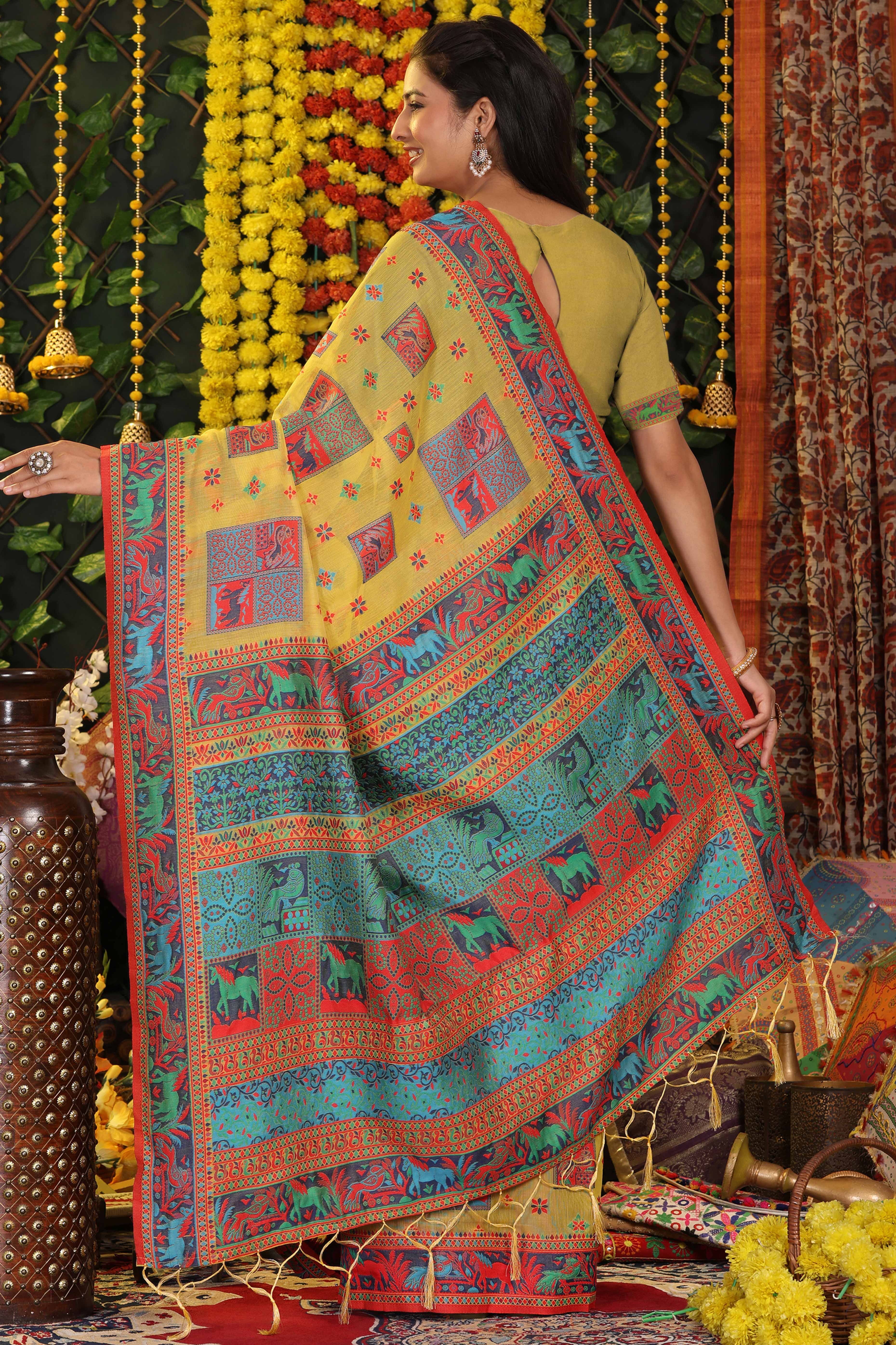 Yellow Linen Cotton Saree Adorned With Floral Zari Weaving & Tassel Pallu