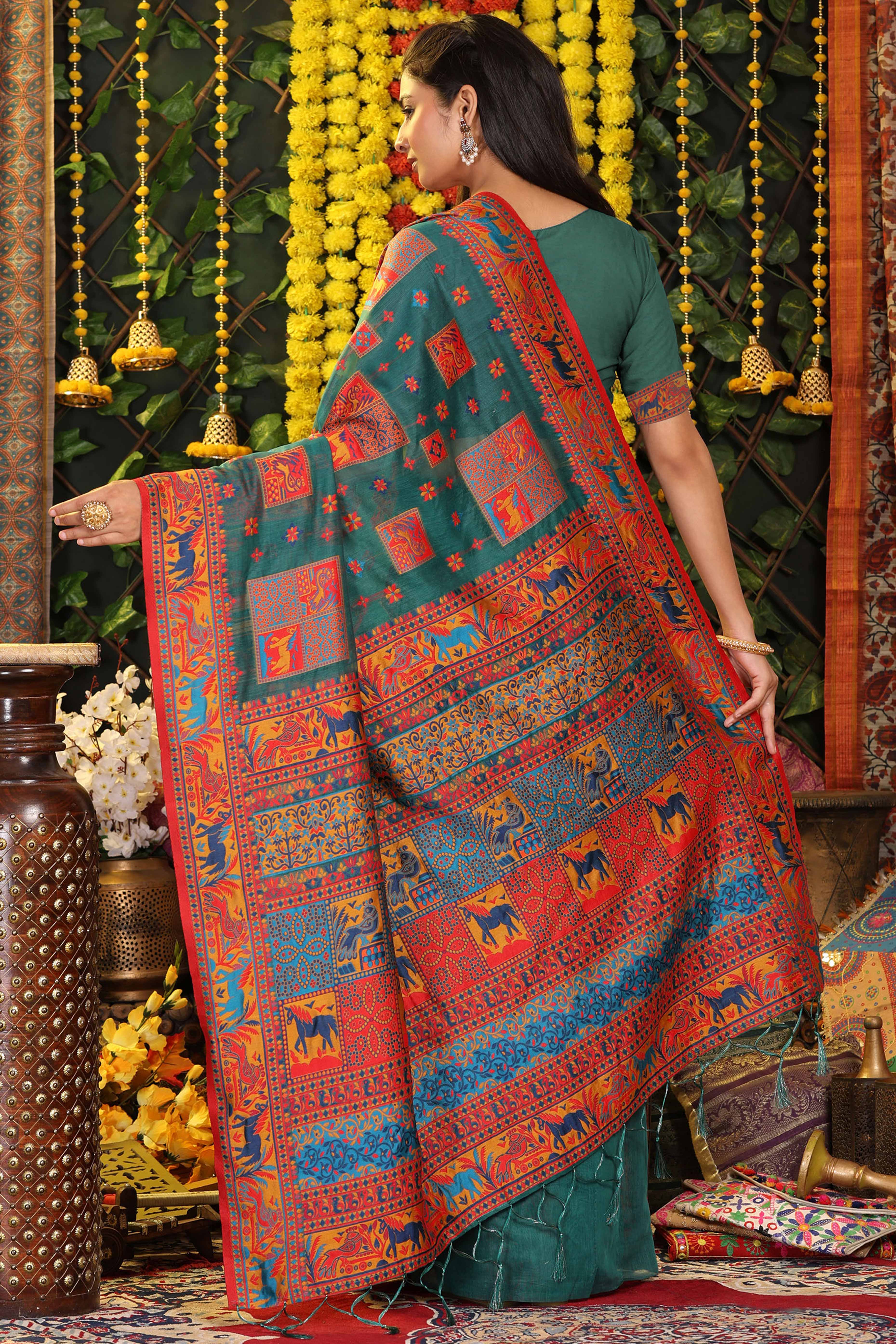 Teal Green Linen Cotton Saree Adorned With Floral Zari Weaving & Tassel Pallu