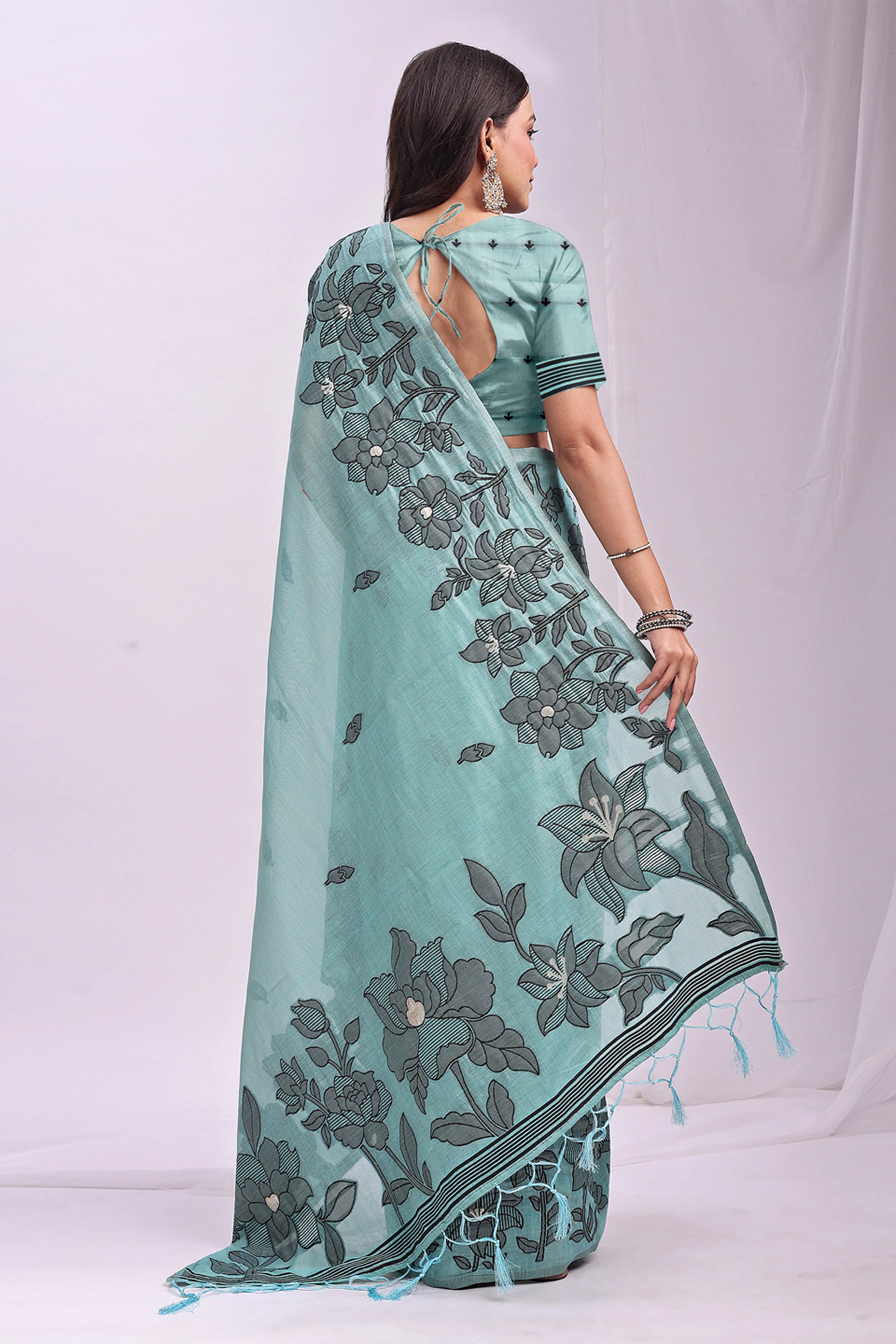Sea Green Ethnic Saree in a Linen Cotton Blend Adorned with Floral Weave Designs