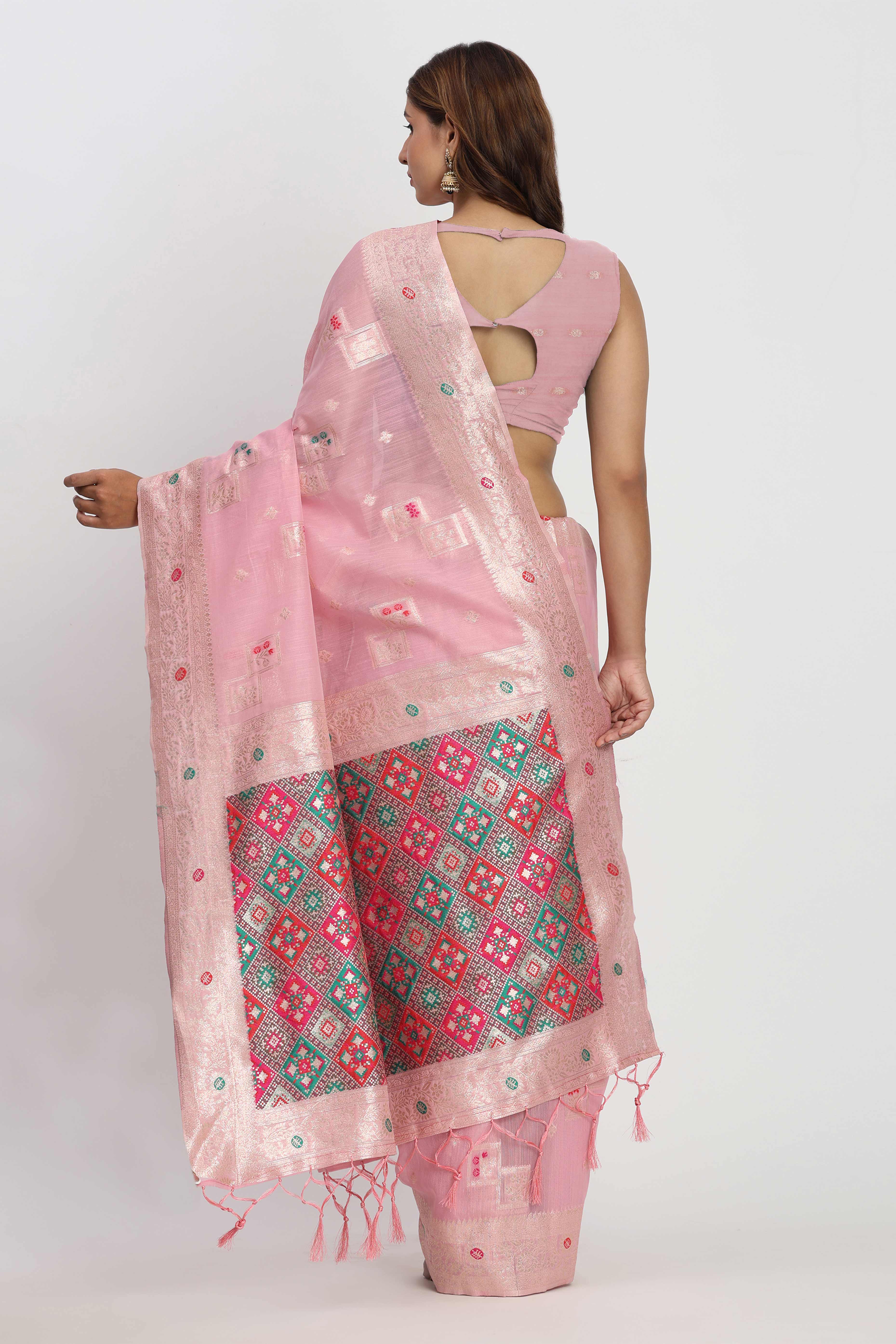 Floral Zari Weaving Brings Regal Beauty To This Light Pink Linen Cotton Saree With Tassel Accents