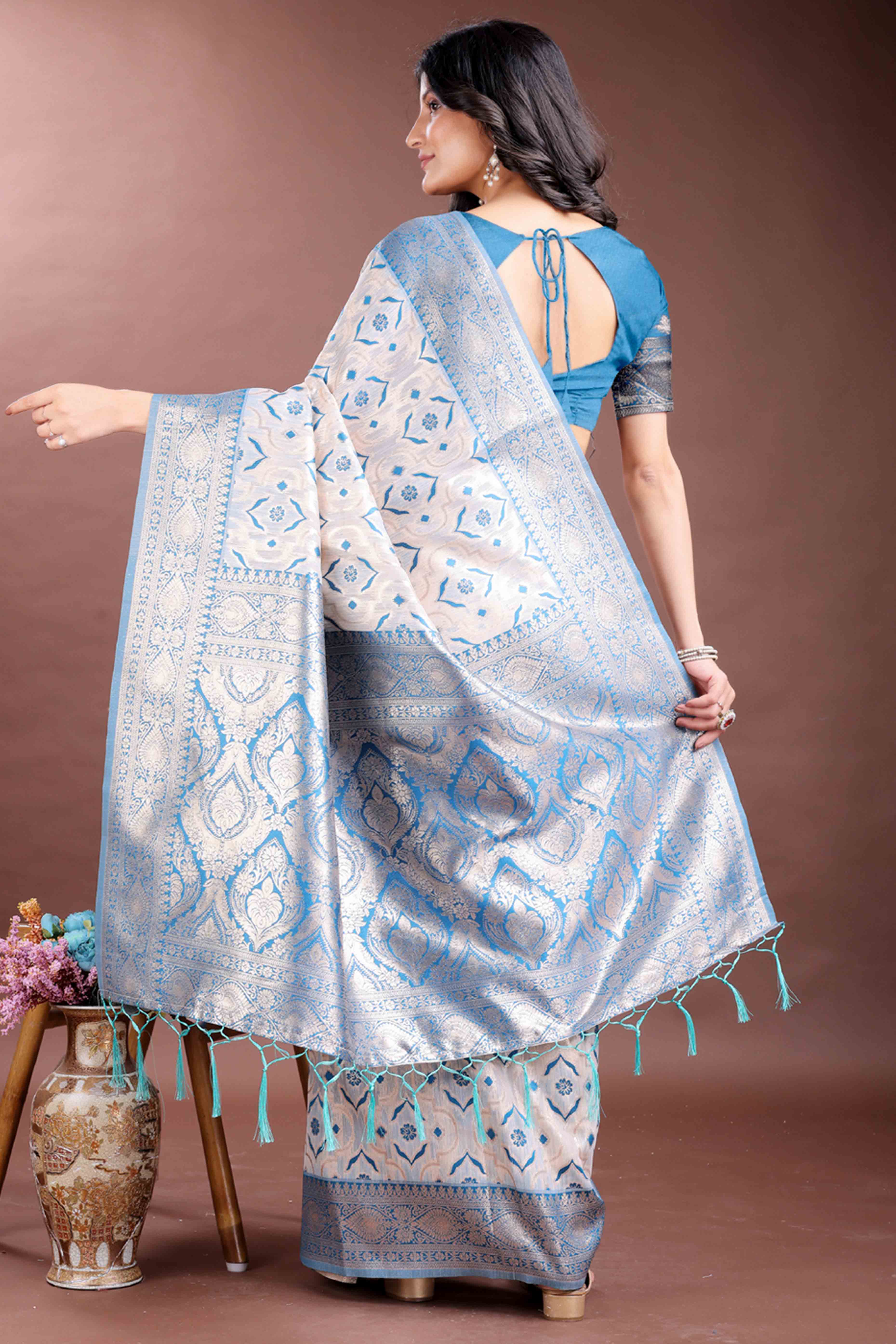 Tranquil Sky Blue Traditional Ikkat Style Zari Weaving Cotton Blend Saree with Charming Tassel Details