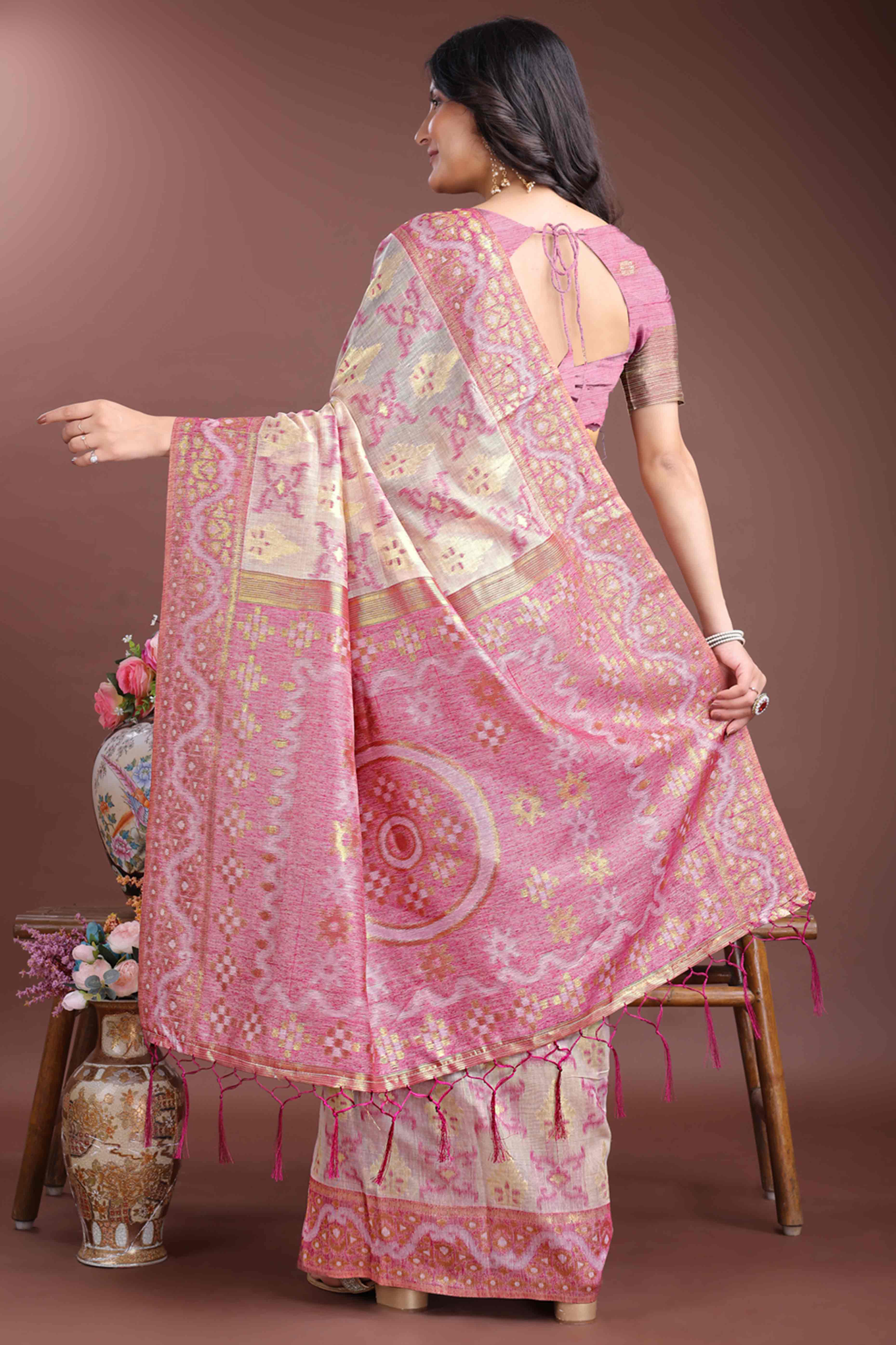 Graceful Pink Traditional Ikkat Style Zari Weaving Cotton Blend Saree with Lovely Tassel Accents