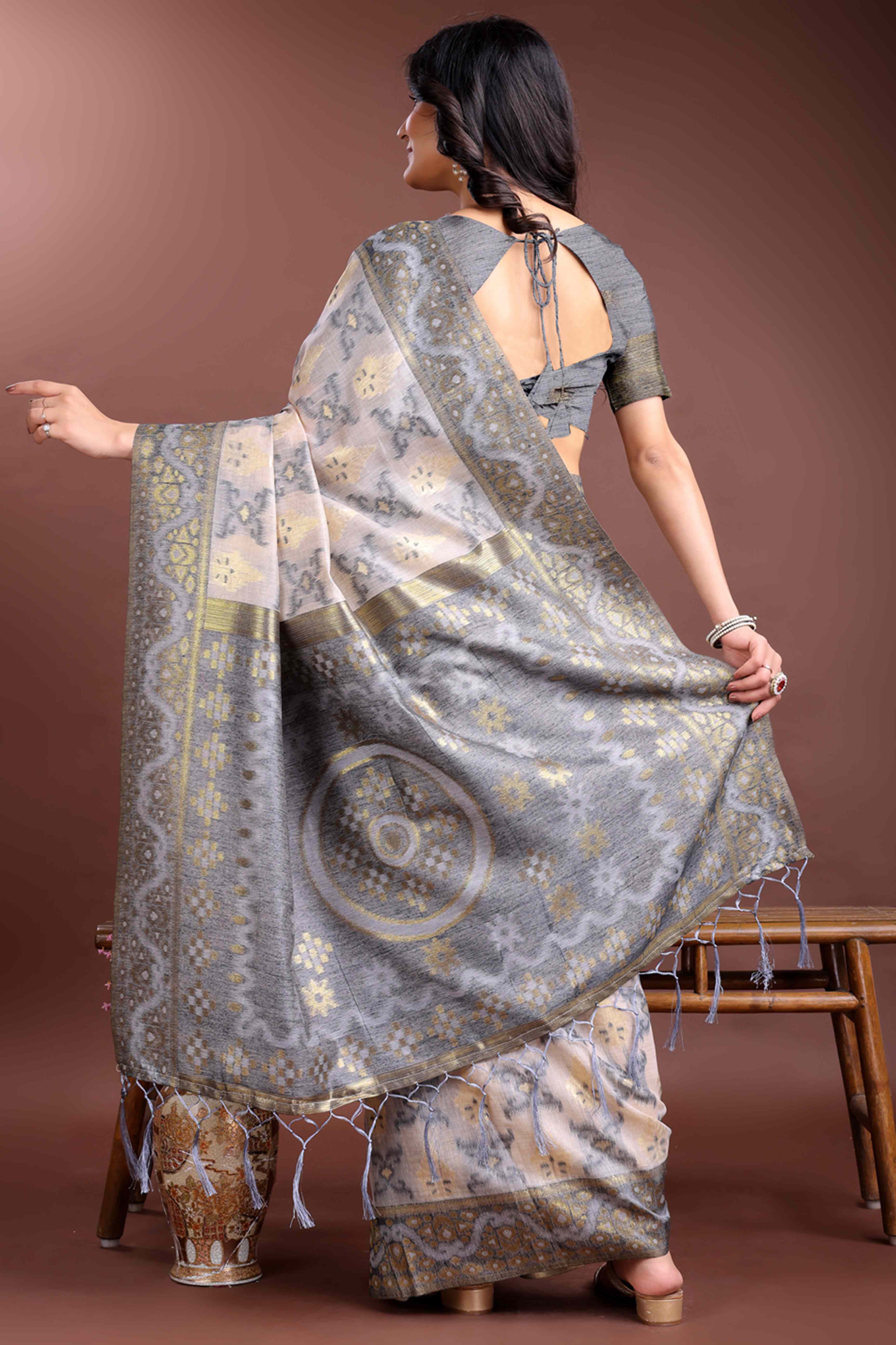 Stylish Grey Traditional Ikkat Style Zari Weaving Cotton Blend Saree with Subtle Tassel Ornaments