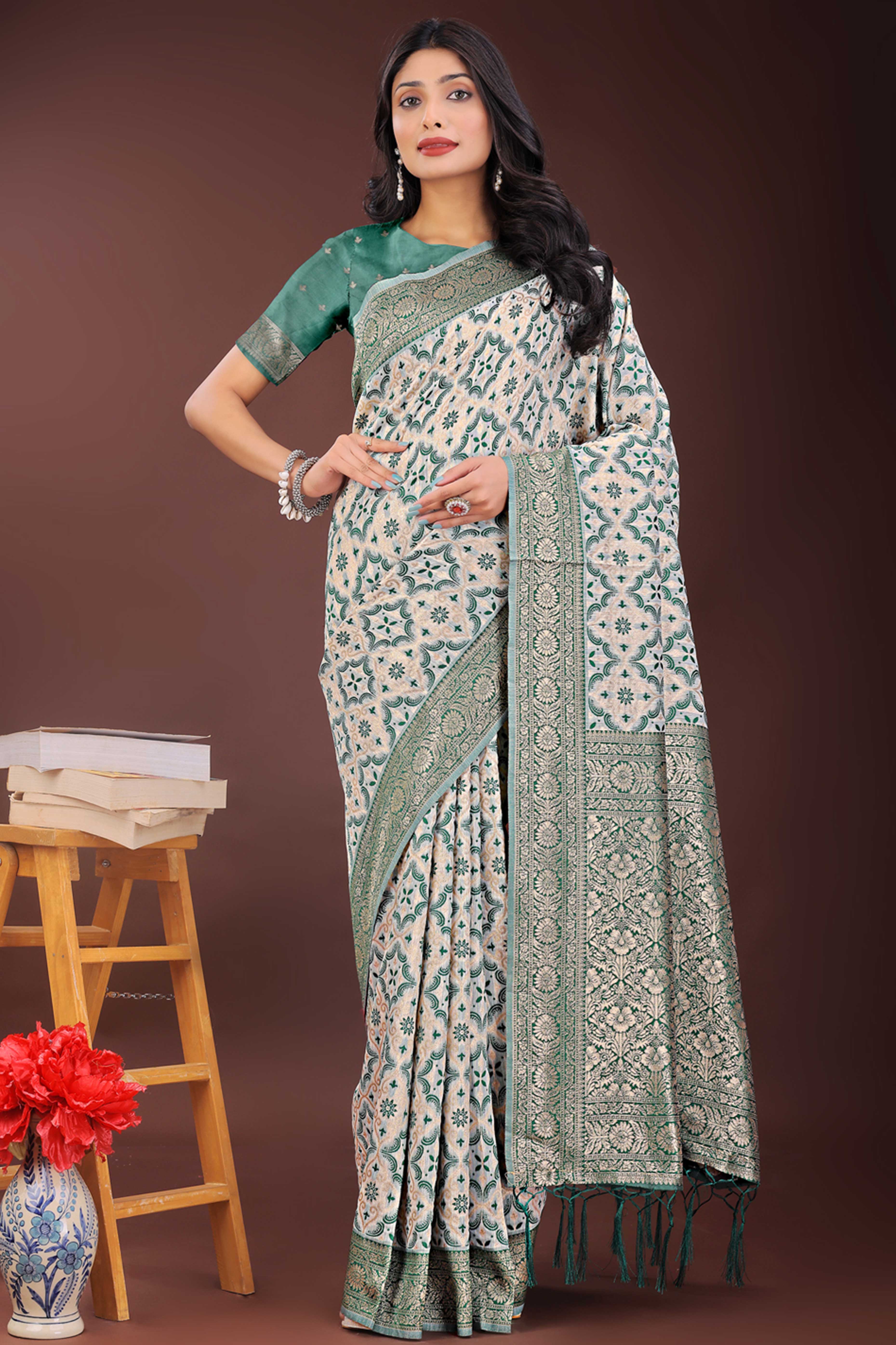 Green Cotton Blend Saree with Woven Floral Brocade Patterns and Tasseled Borders
