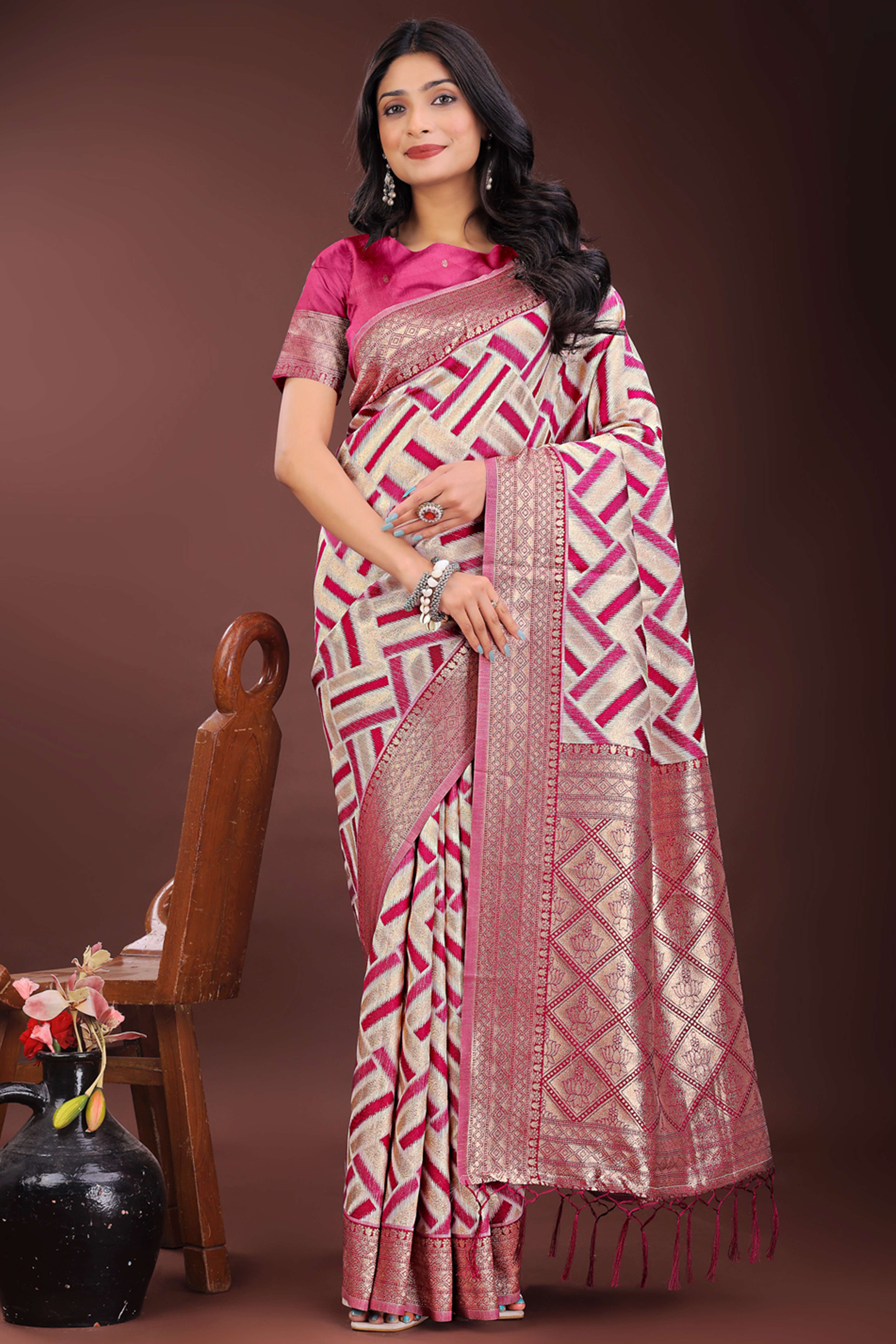 Magenta Saree with Zari Woven Geometric Motifs and Graceful Tassel Accents