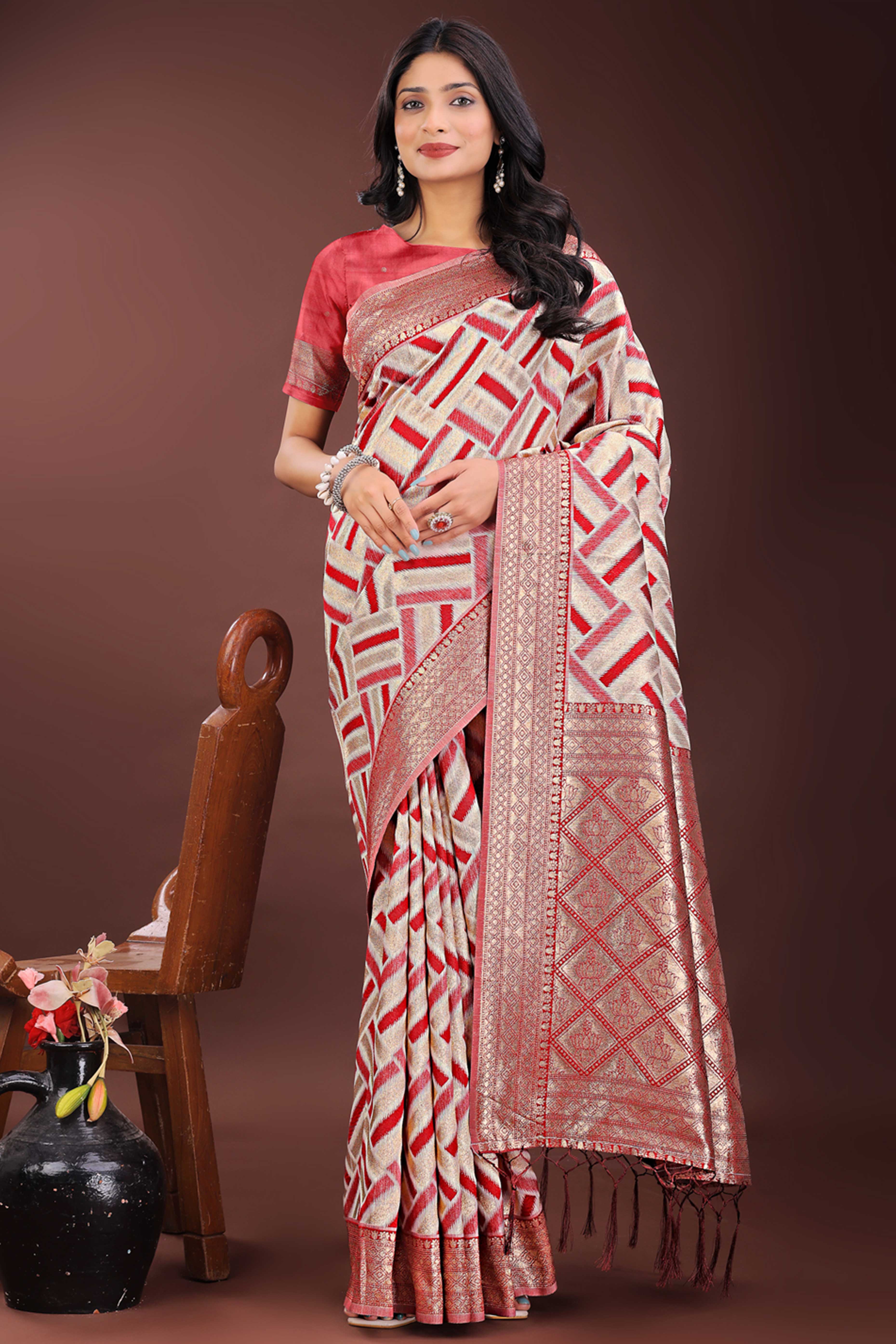 Red Saree with Zari Woven Geometric Motifs and Graceful Tassel Accents