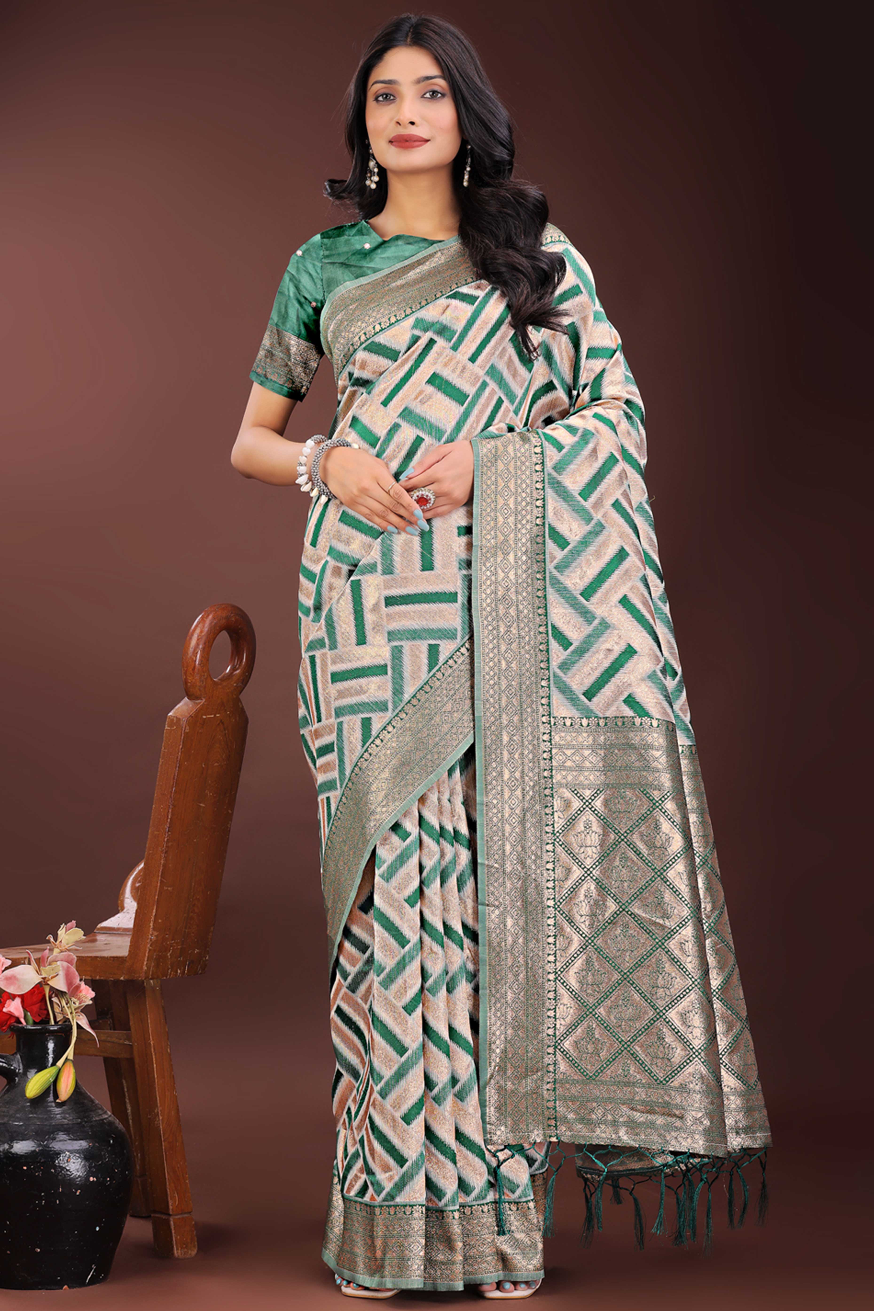 Green Saree with Zari Woven Geometric Motifs and Graceful Tassel Accents