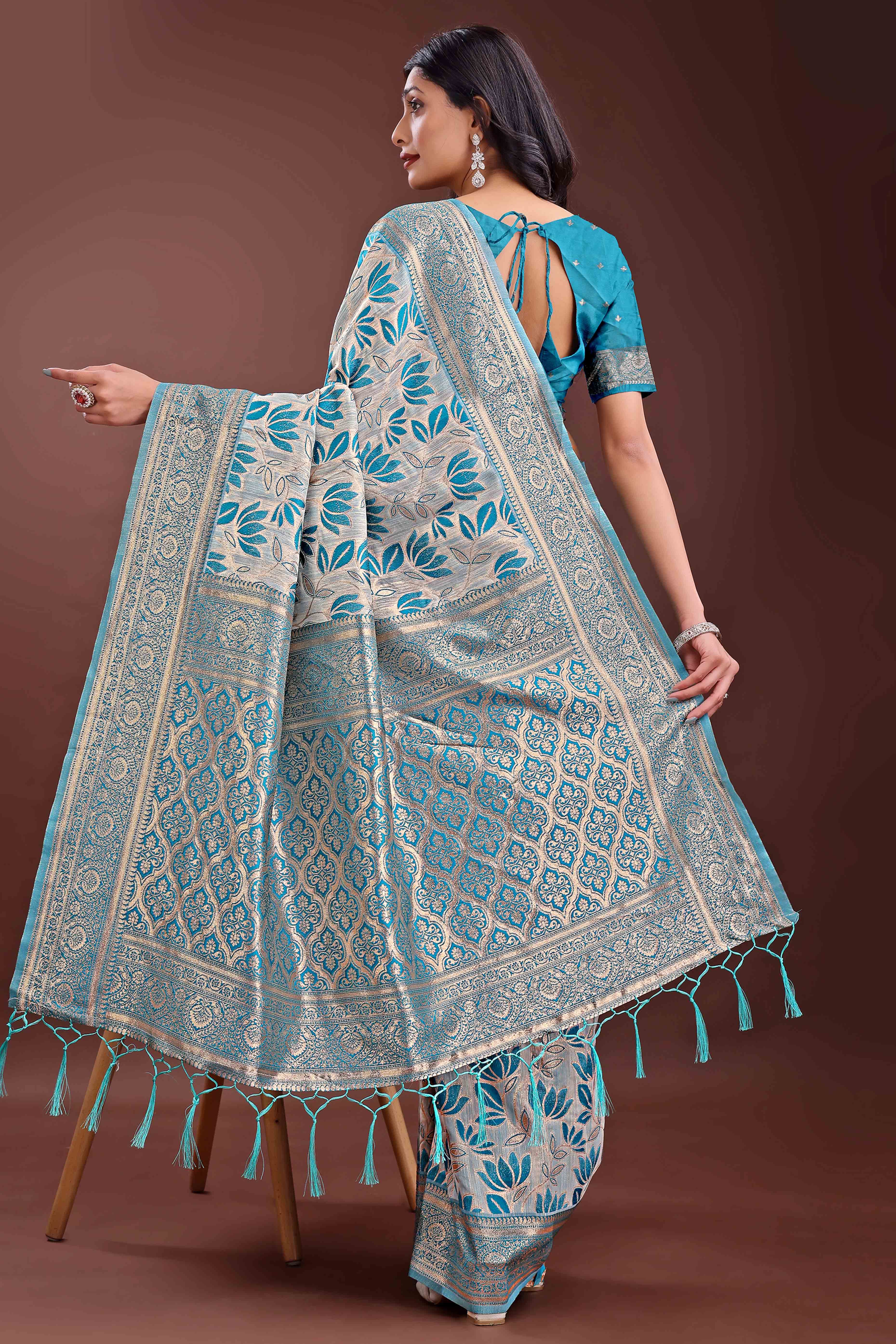 Sky Blue Linen Cotton Saree Featuring Graceful Floral Patterns in Zari Weave