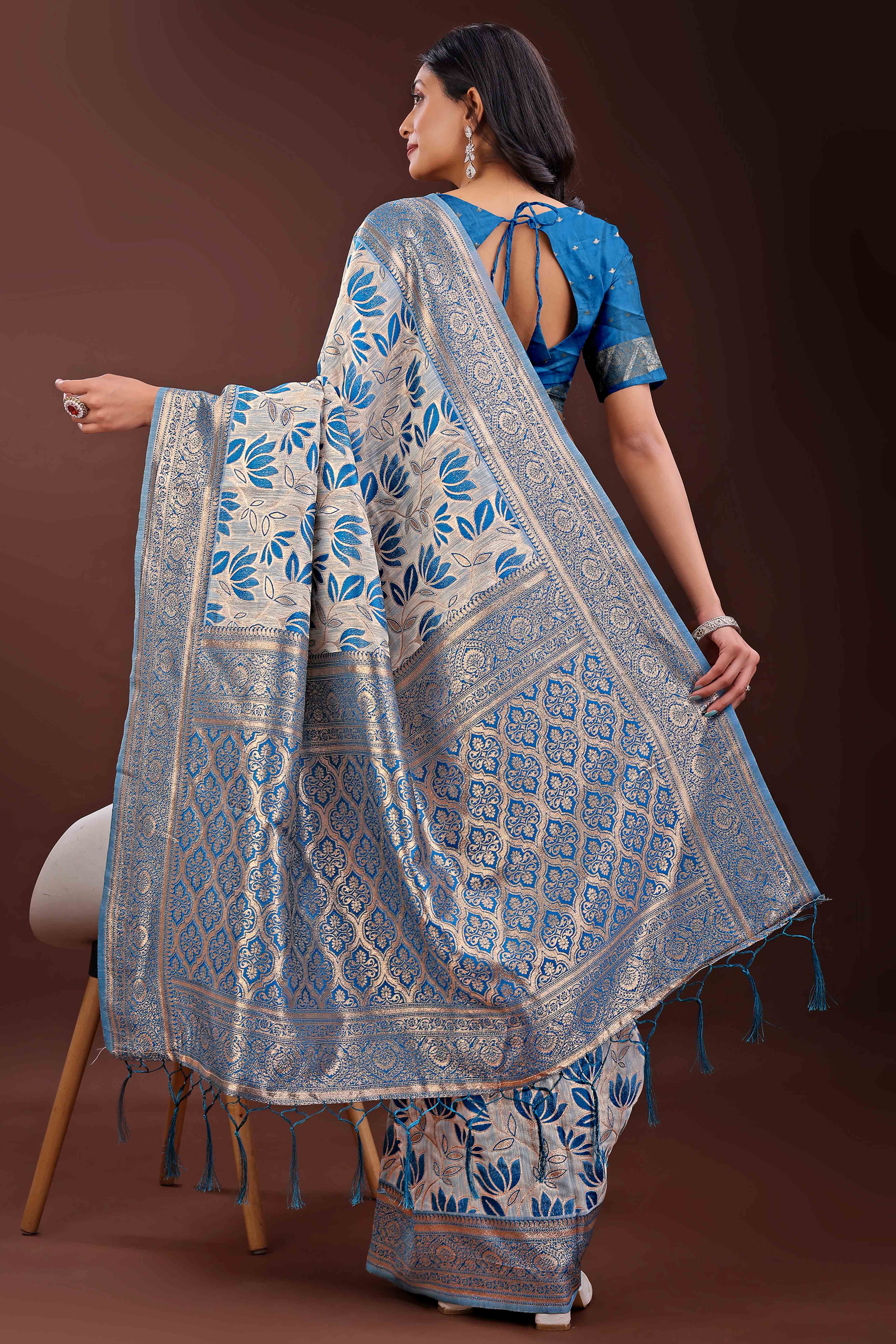 Blue Linen Cotton Saree Featuring Graceful Floral Patterns in Zari Weave