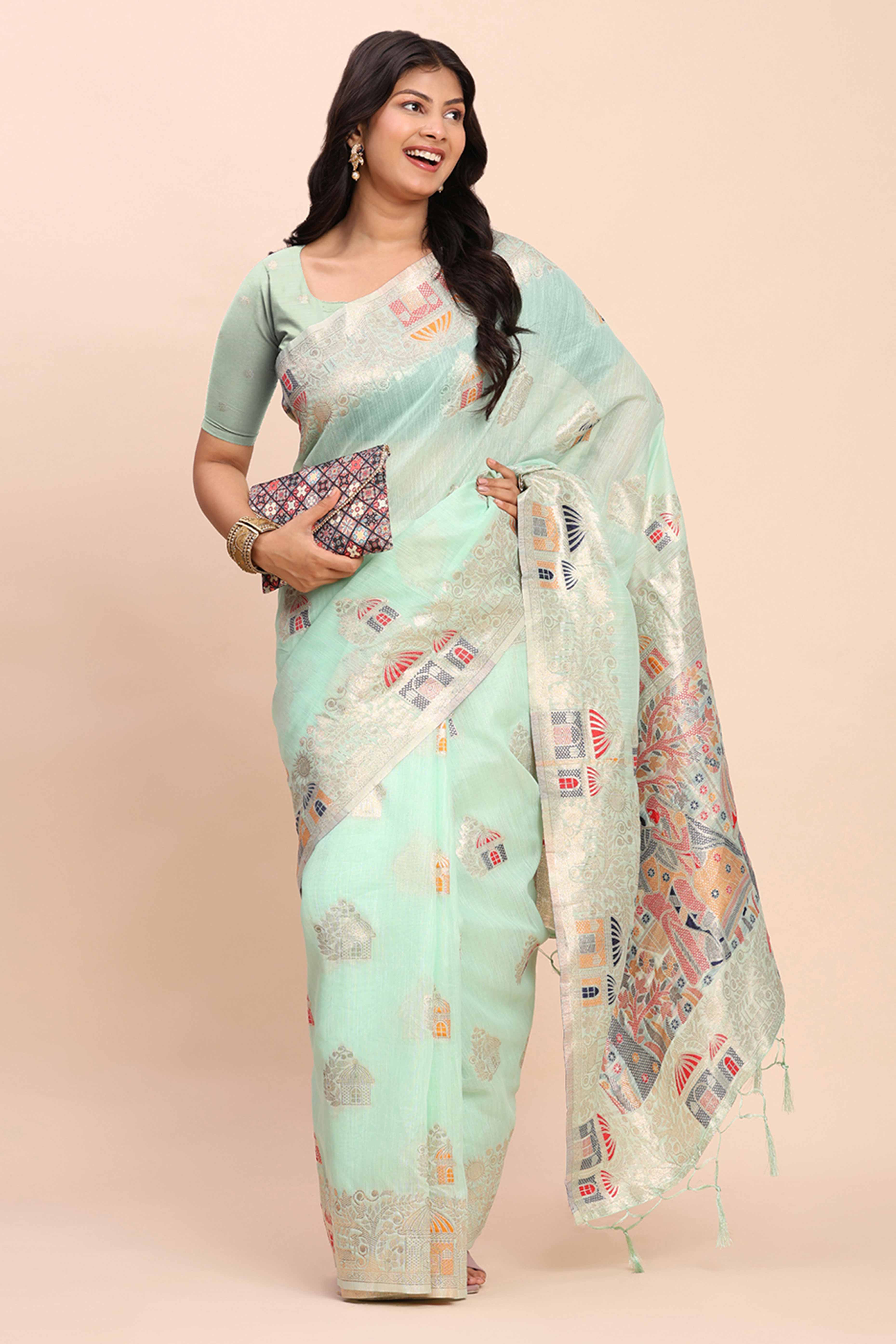 Sea Green Bloom Zari Woven Linen Cotton Saree Adorned With Floral Motifs & A Tassel Finish