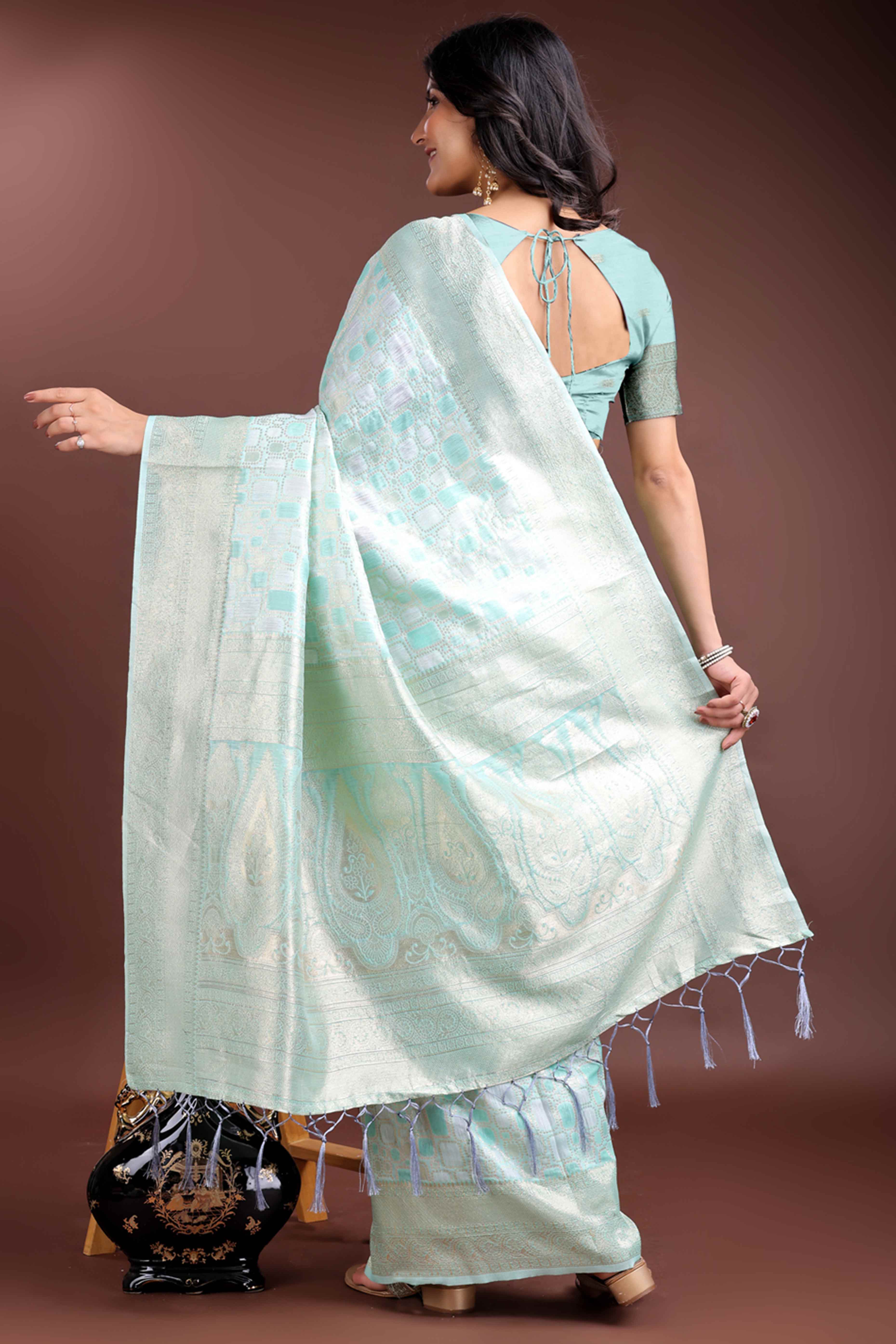 Serene Sea Green Geometric Style Zari Weaving Cotton Blend Saree Featuring Artistic Tassels
