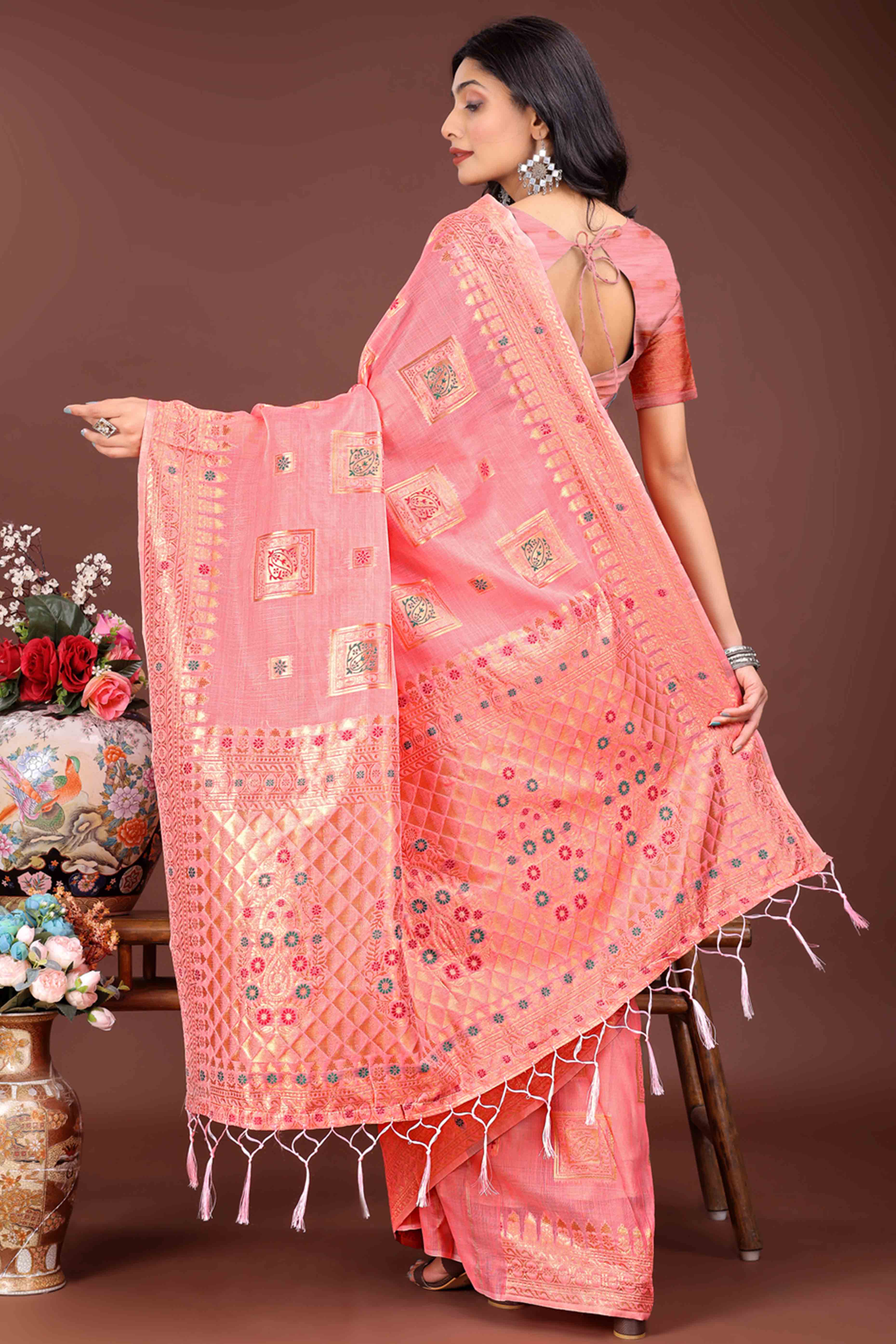 Refreshing Floral Zari Weaving Embellished Gajari Pink Saree In Linen Cotton with Tassel Accents