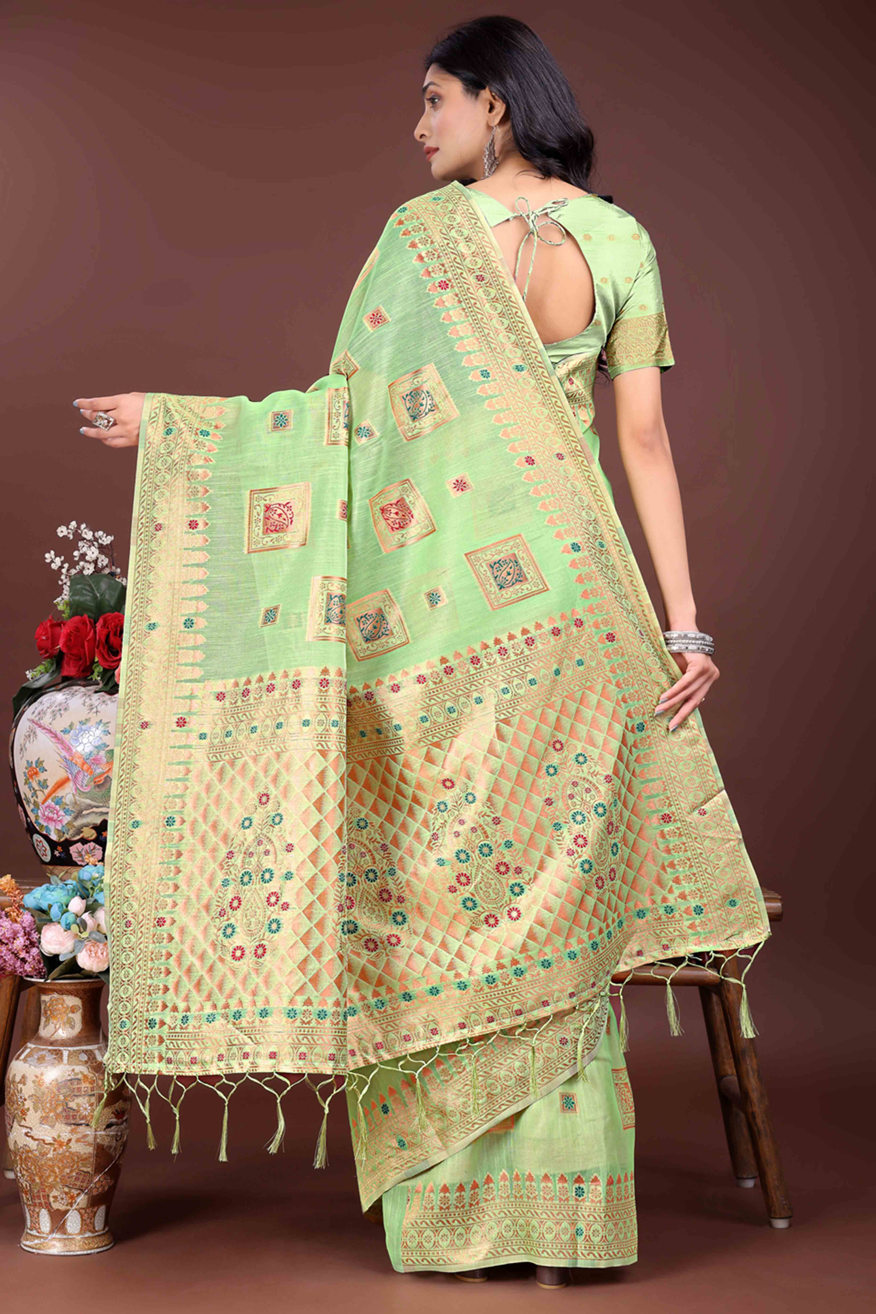Sophisticated Floral Zari Weaving Embellished Green Saree In Linen Cotton with Tassel Accents