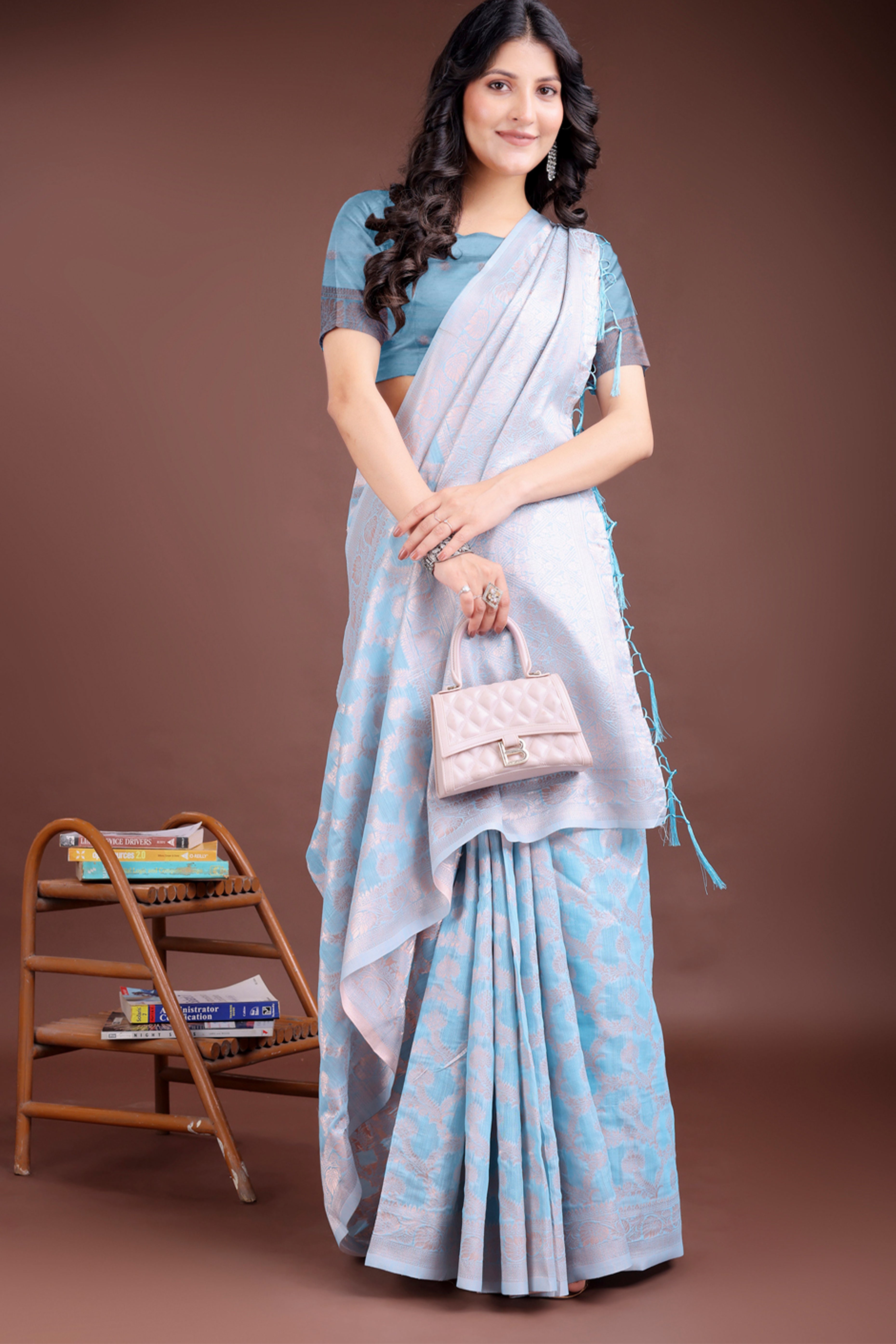 Sky Blue Linen Cotton Saree with Lustrous Zari Borders and Elegant Tassel Accents