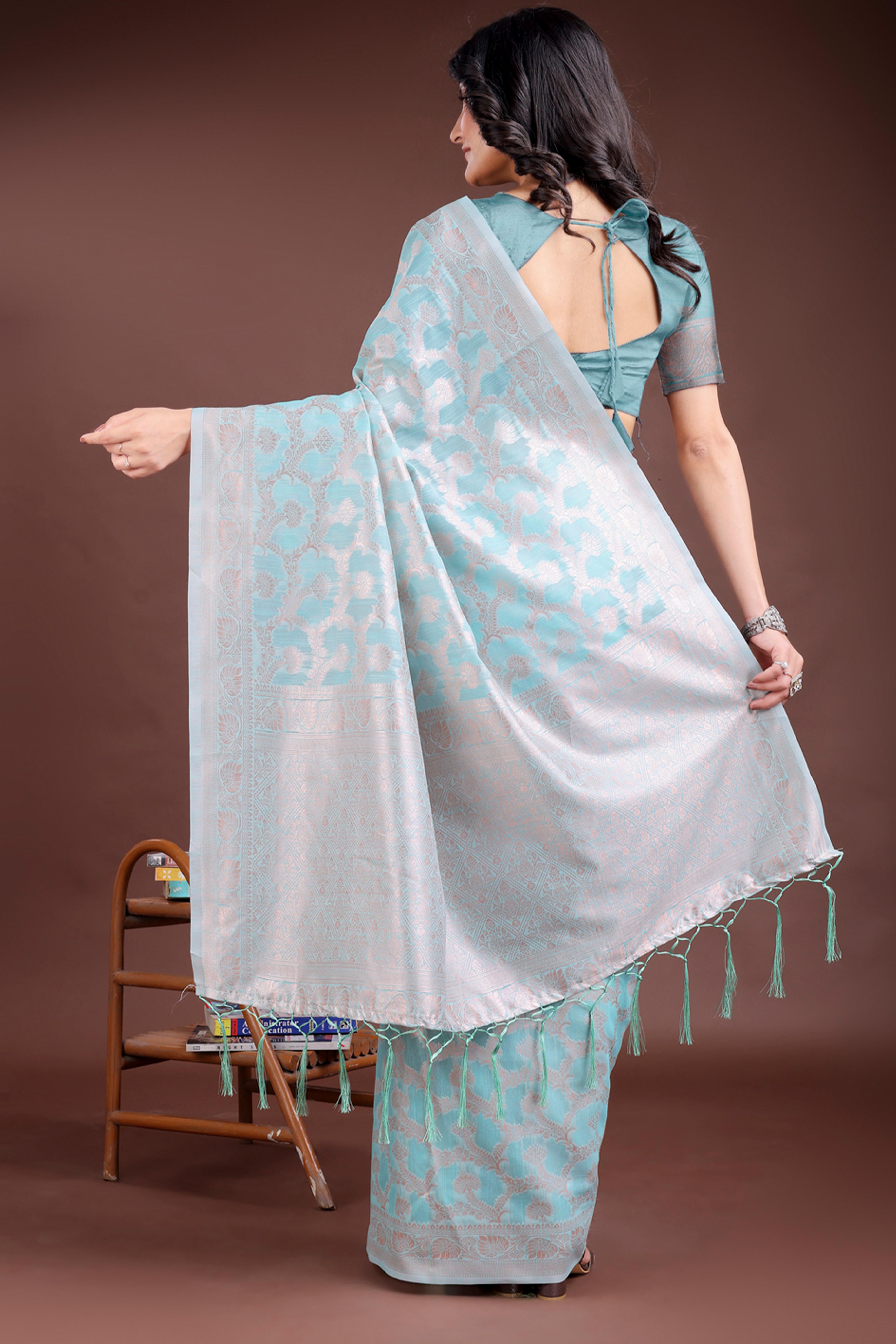 Sea Green Linen Cotton Saree with Lustrous Zari Borders and Elegant Tassel Accents