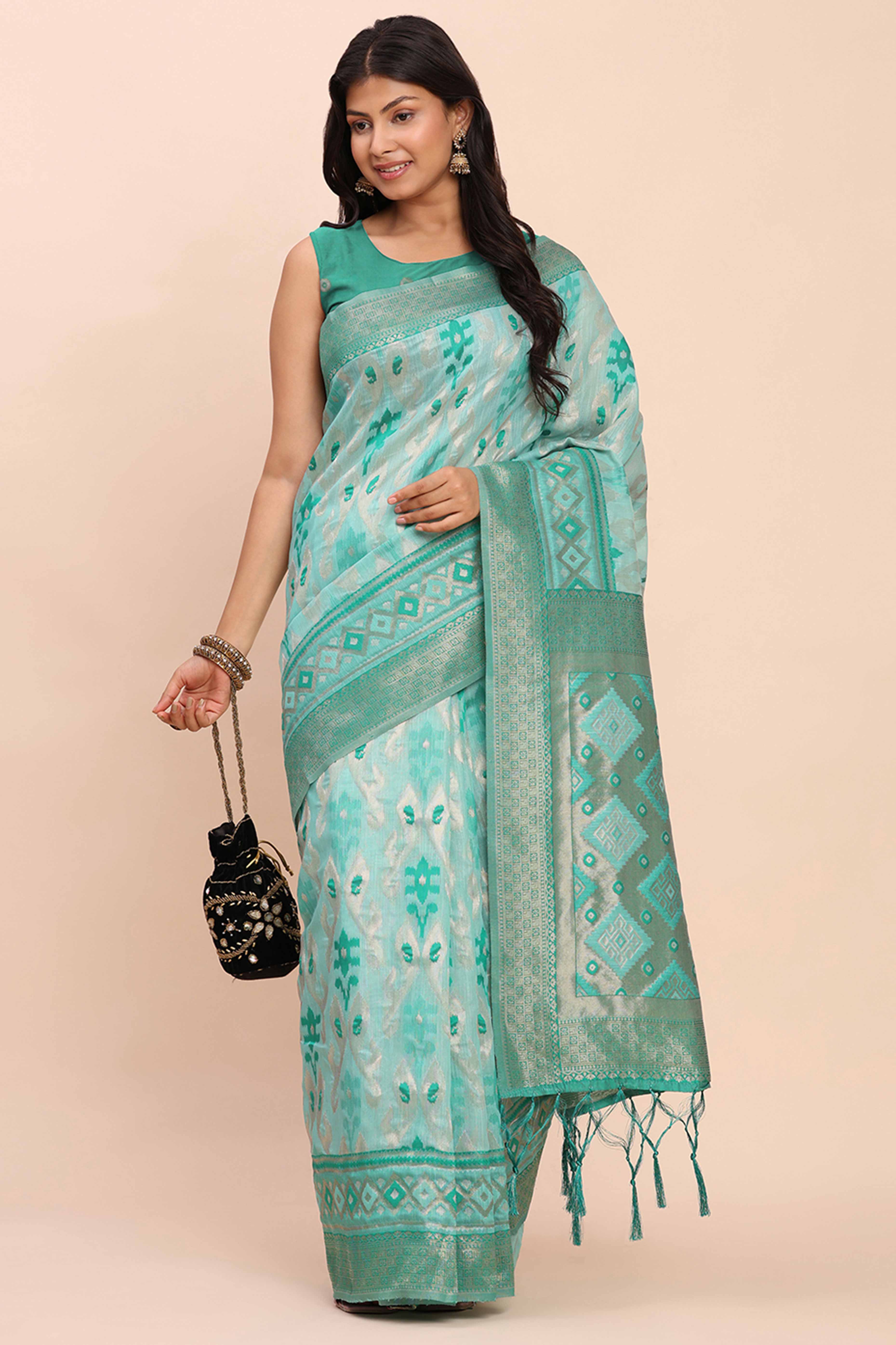 Turquoise Patola Inspired Linen Cotton Saree Adorned With Zari Weaving & Graceful Tassel Pallu