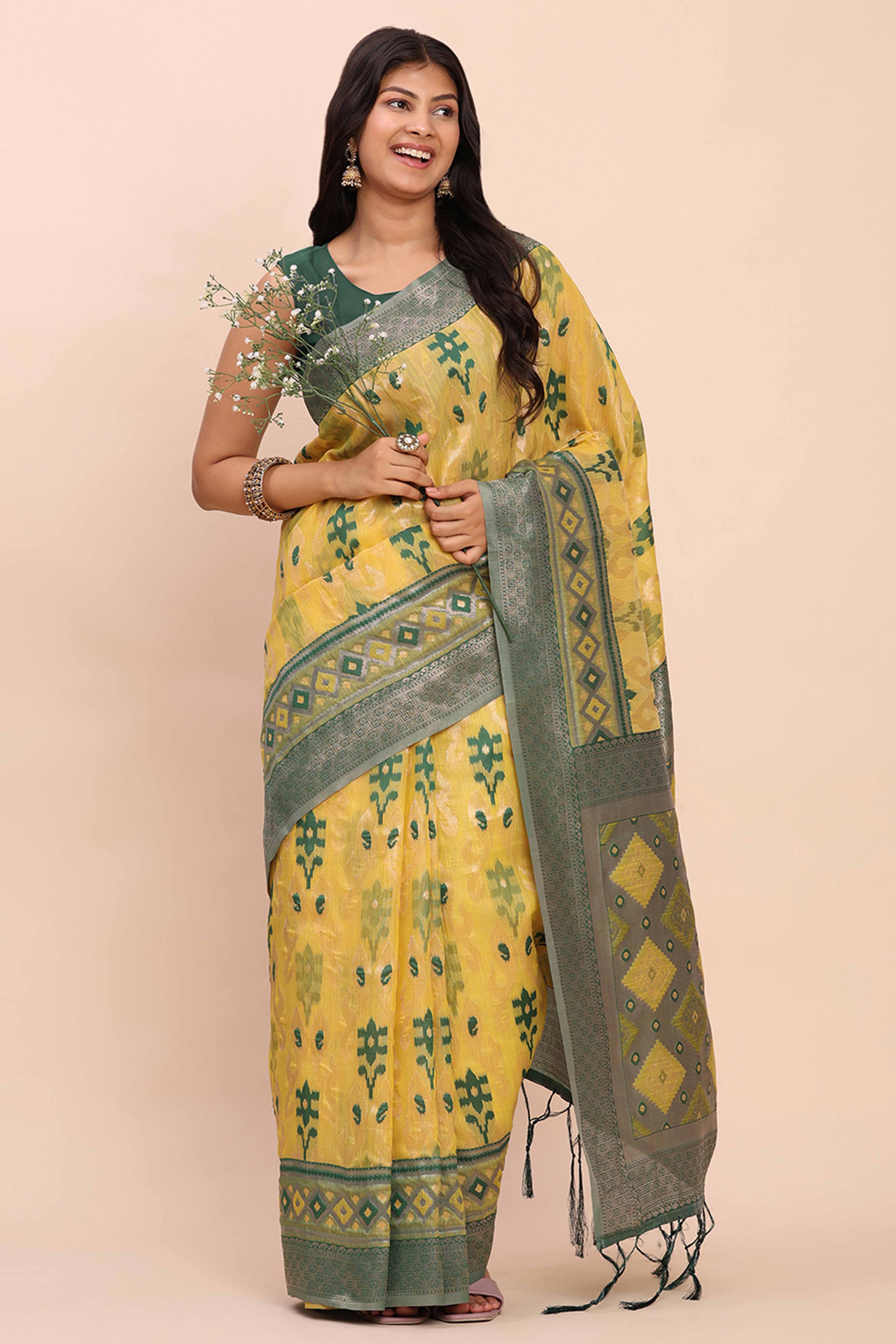 Yellow Patola Inspired Linen Cotton Saree Adorned With Zari Weaving & Graceful Tassel Pallu