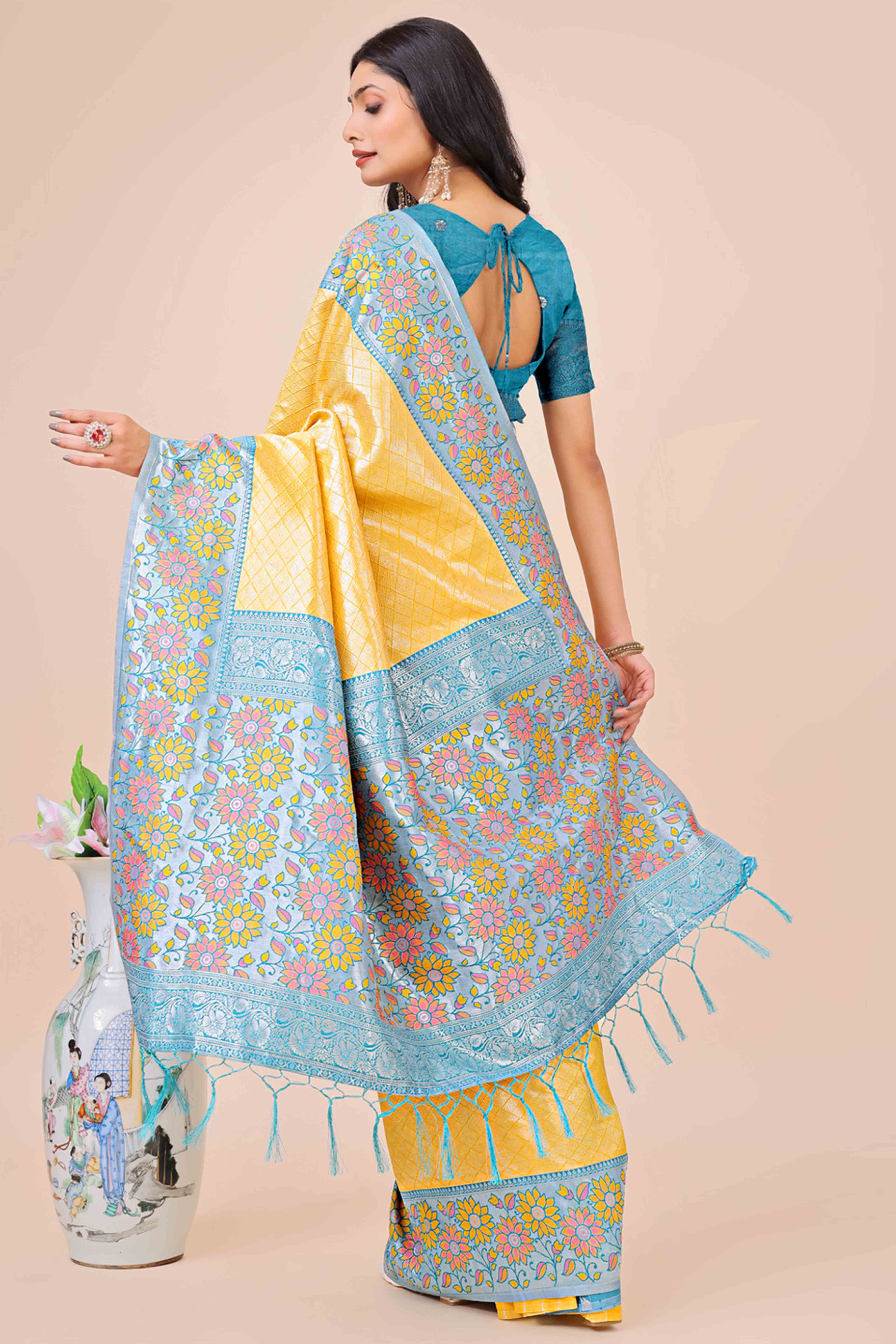 Yellow Lichi Silk Blend Saree With Exquisite Floral Weaving & Graceful Tassel Details