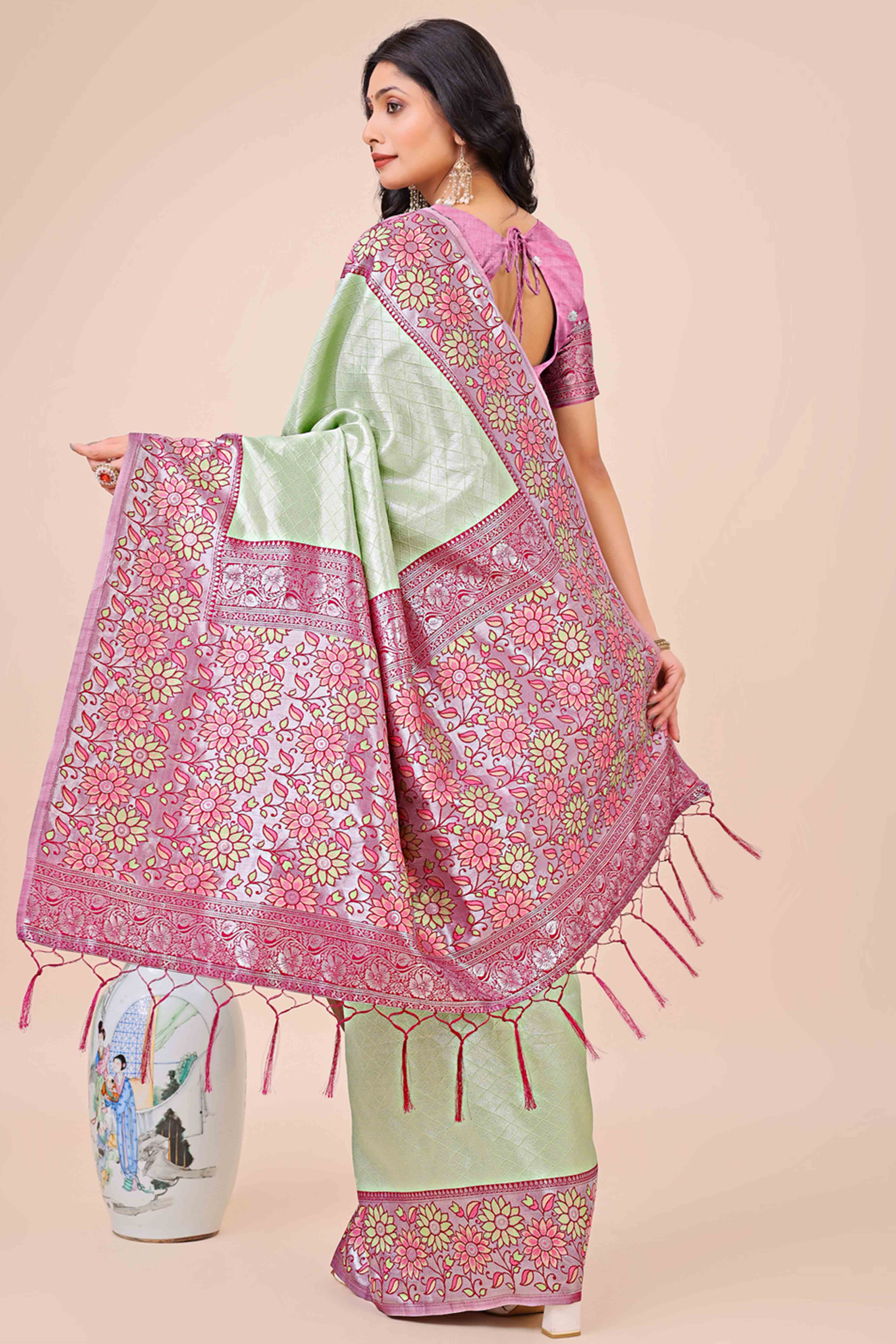 Green Lichi Silk Blend Saree With Exquisite Floral Weaving & Graceful Tassel Details